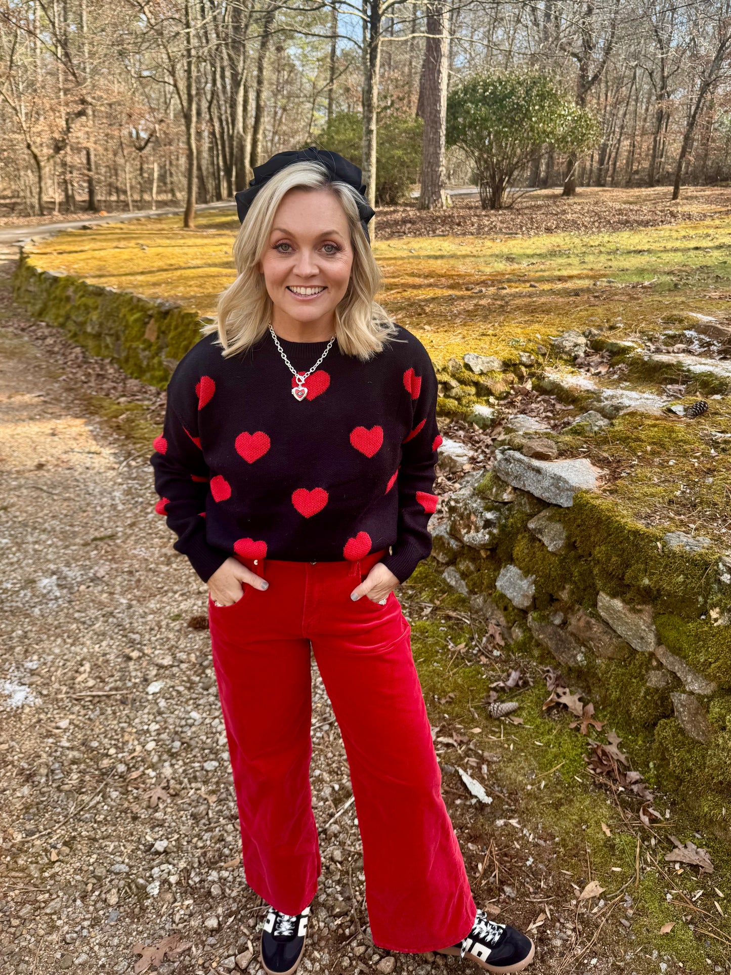 Black sweater red hearts Valentine’s Day marked down