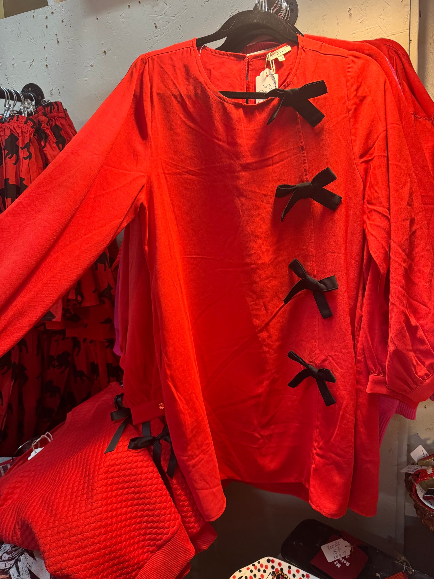 Red dress black bows marked down