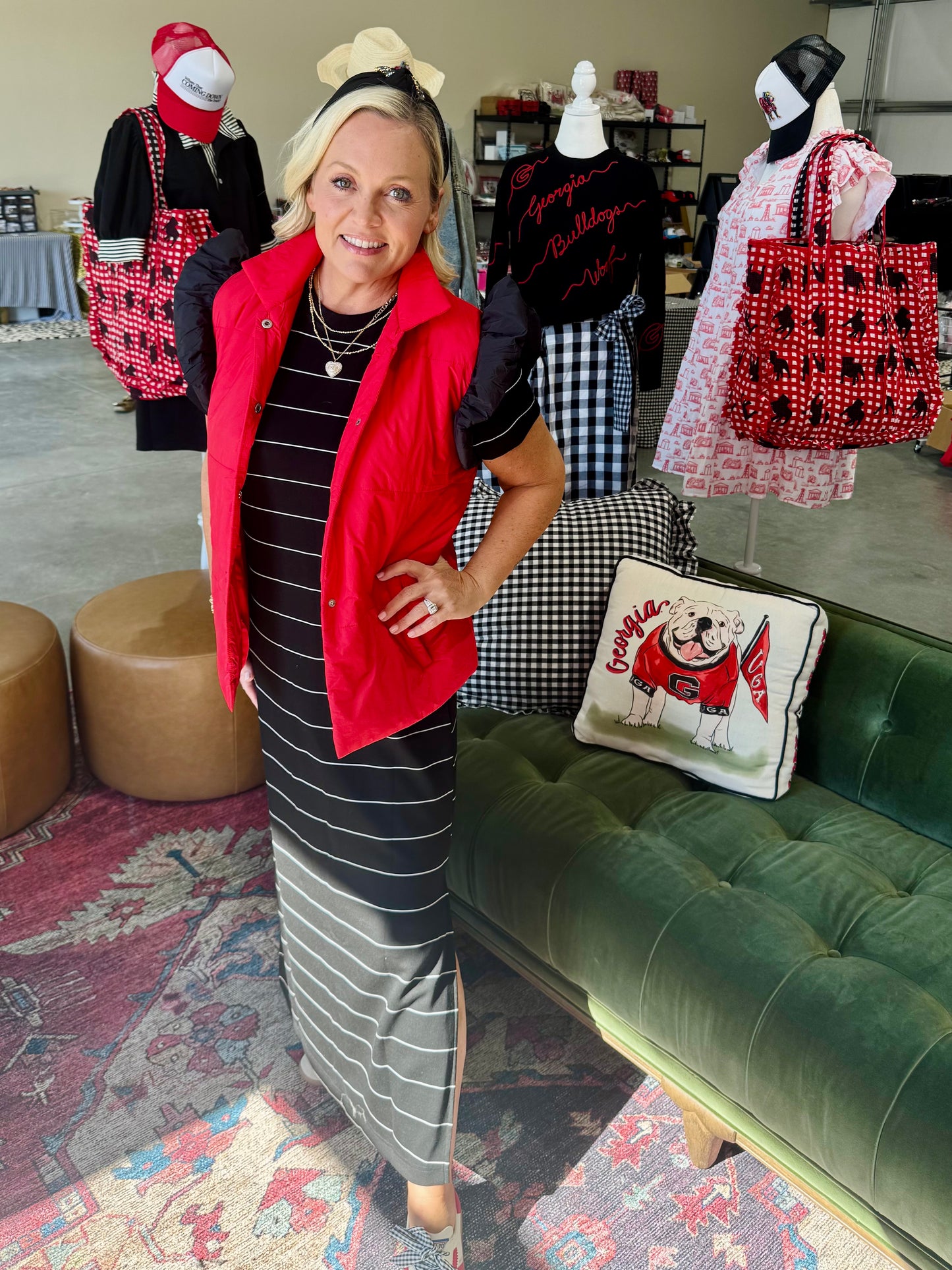 red puffer vest with black ruffle sleeves