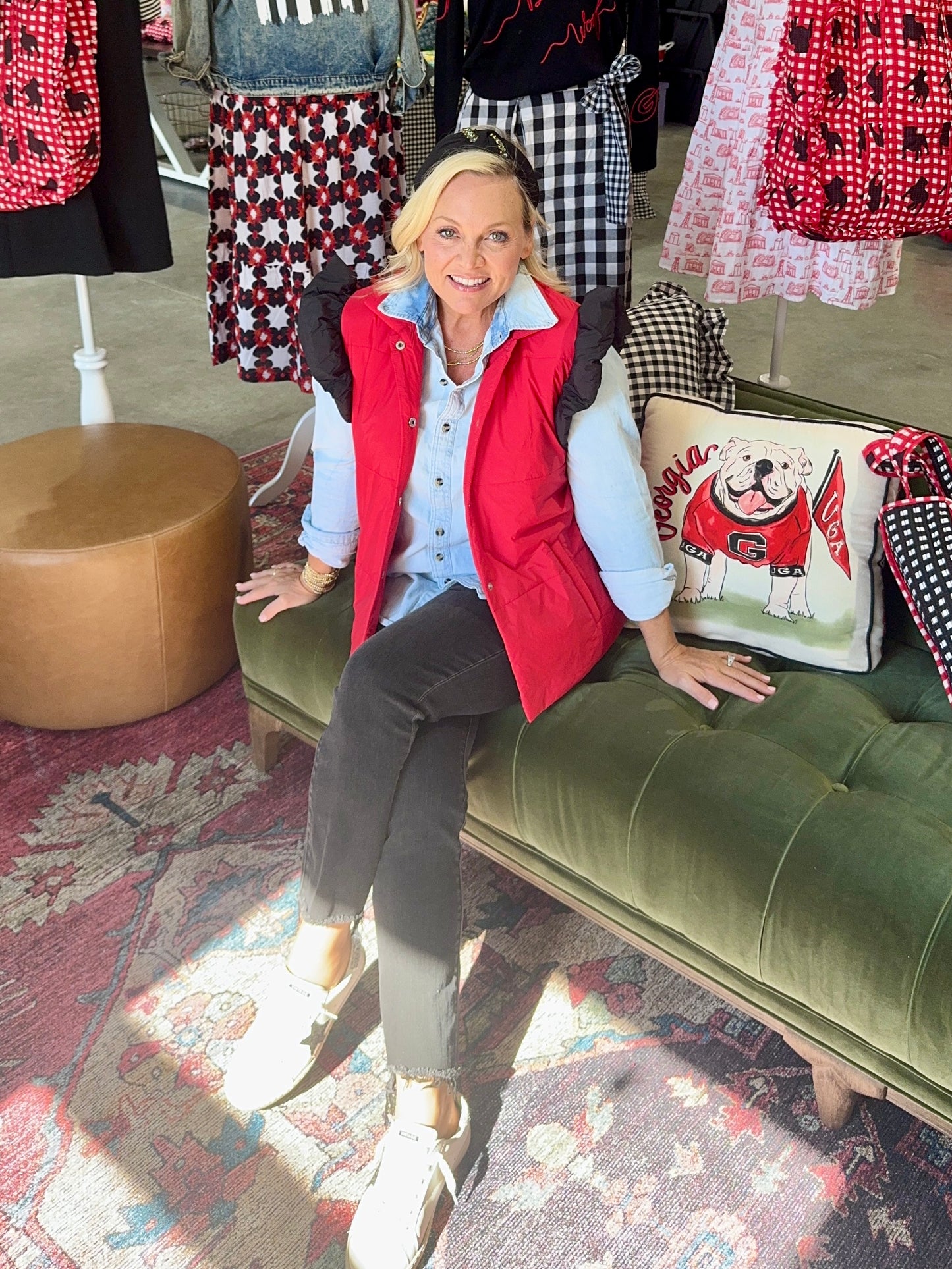 red puffer vest with black ruffle sleeves