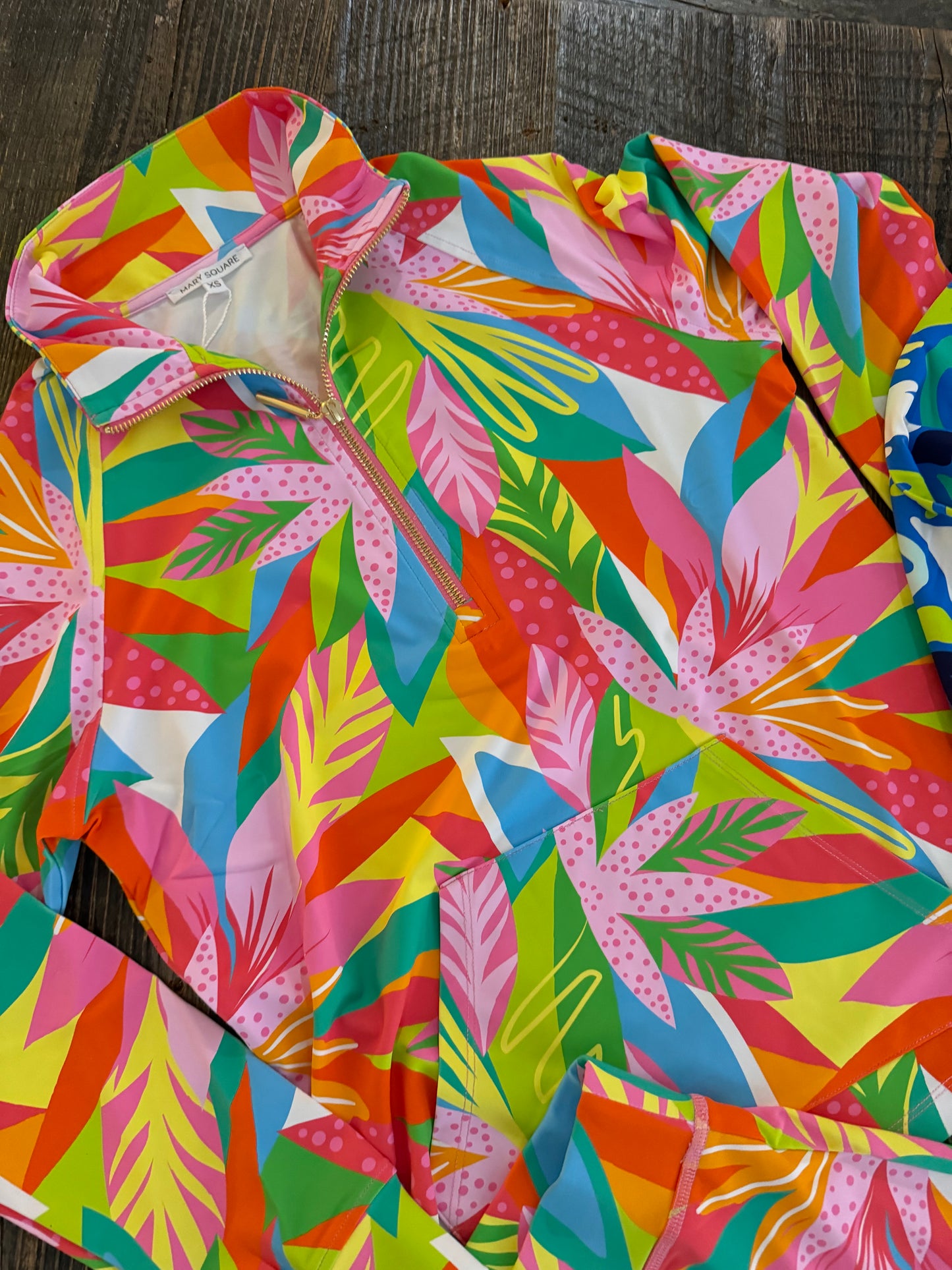 Hamptons active wear top with half zip ruffle sleeve marked down