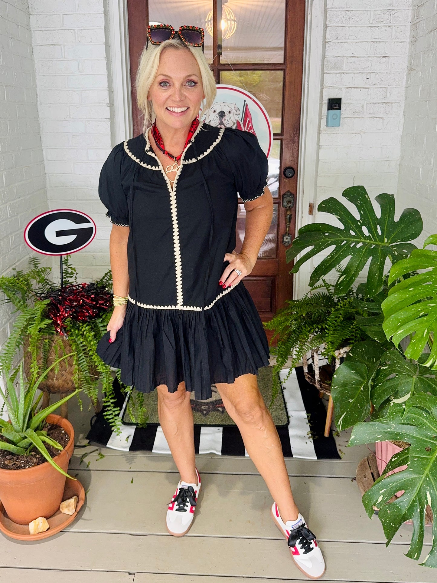 Embroidered trim drop waist black dress