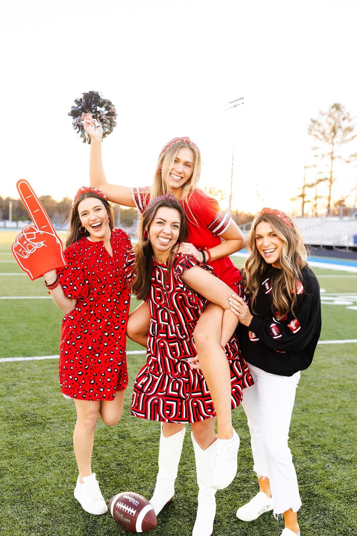 Luxury boutique sweatshirt football sequin UGA fall collection marked down