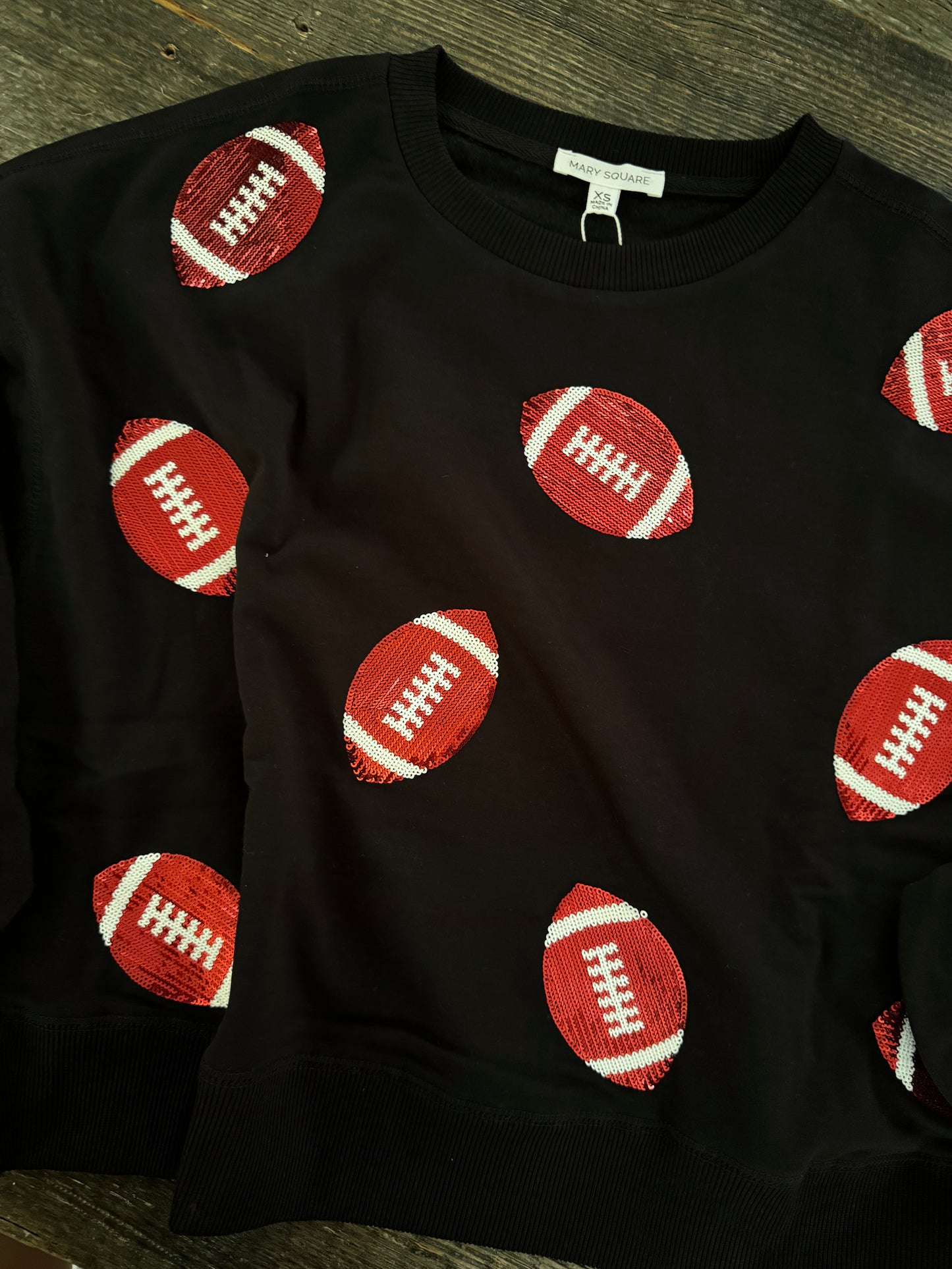 Luxury boutique sweatshirt football sequin UGA fall collection marked down