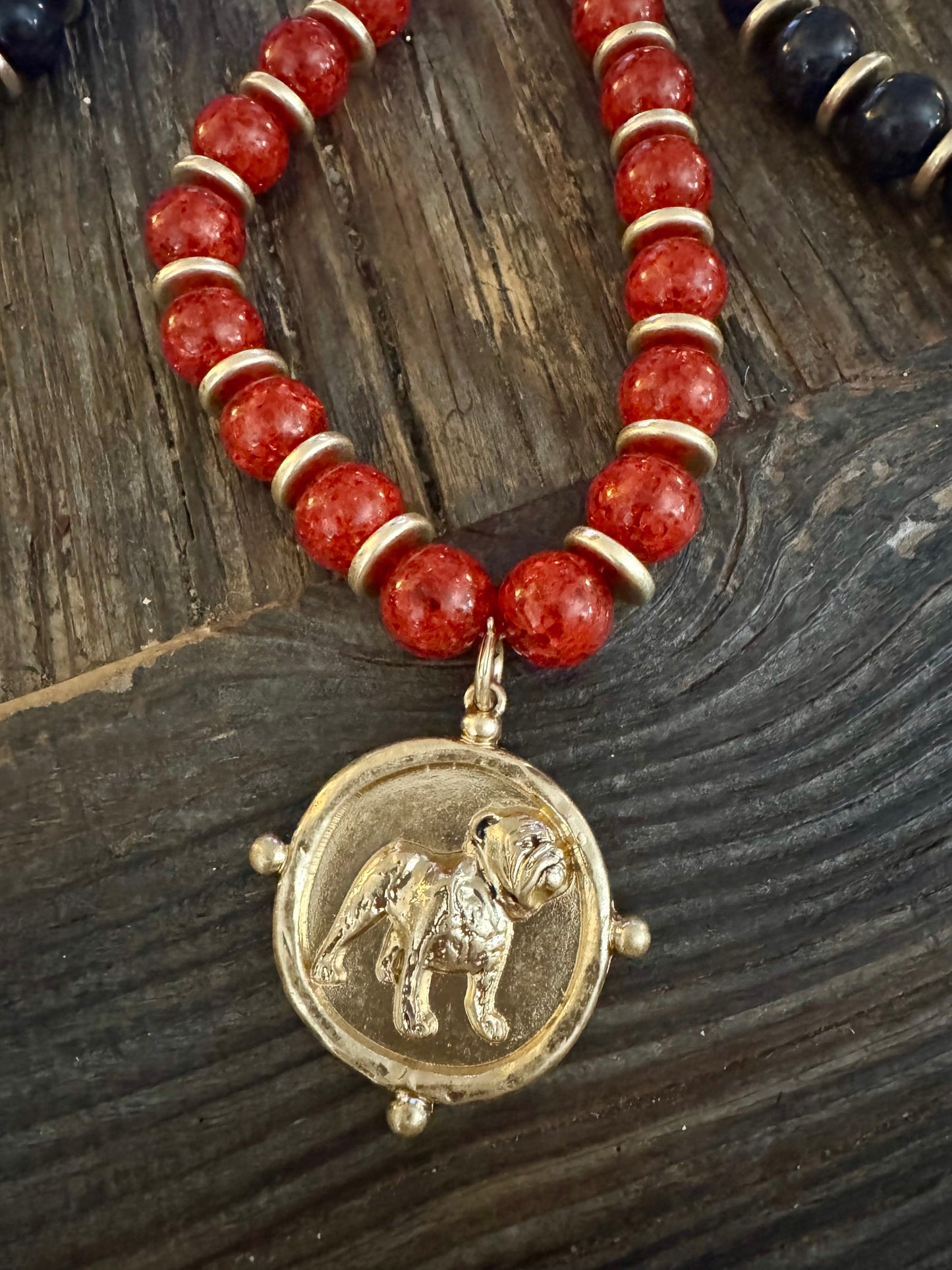 Black or red beaded necklace with gold metal bulldog medalion