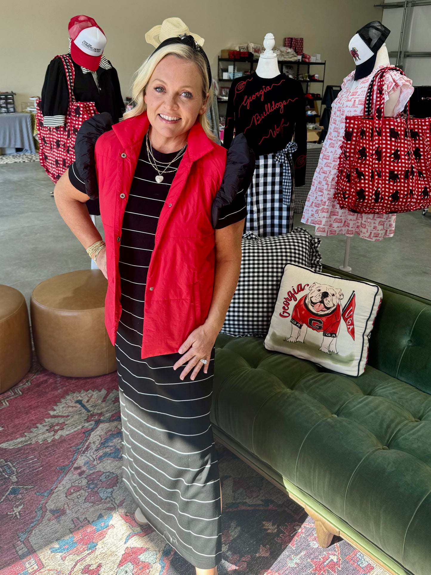 red puffer vest with black ruffle sleeves