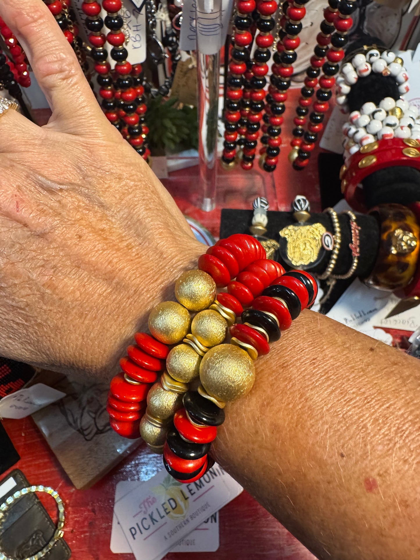 Red bracelet with gold beads large