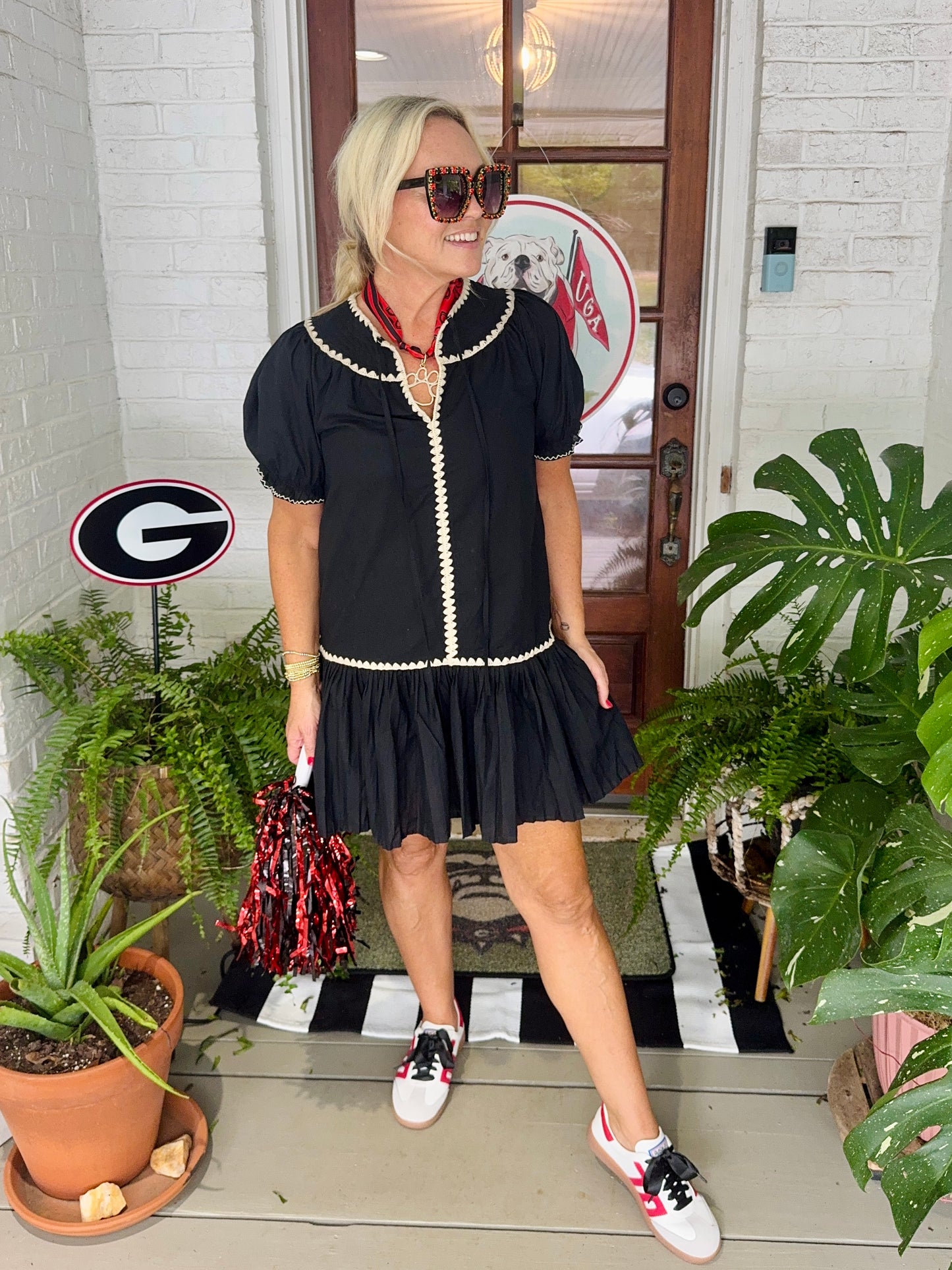 Embroidered trim drop waist black dress