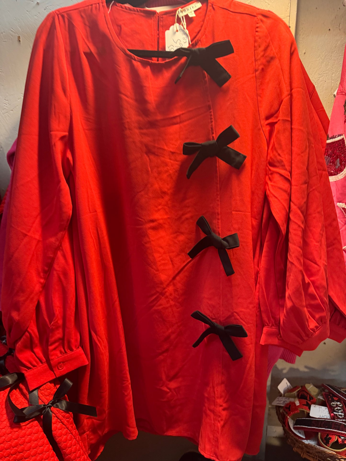 Red dress black bows marked down