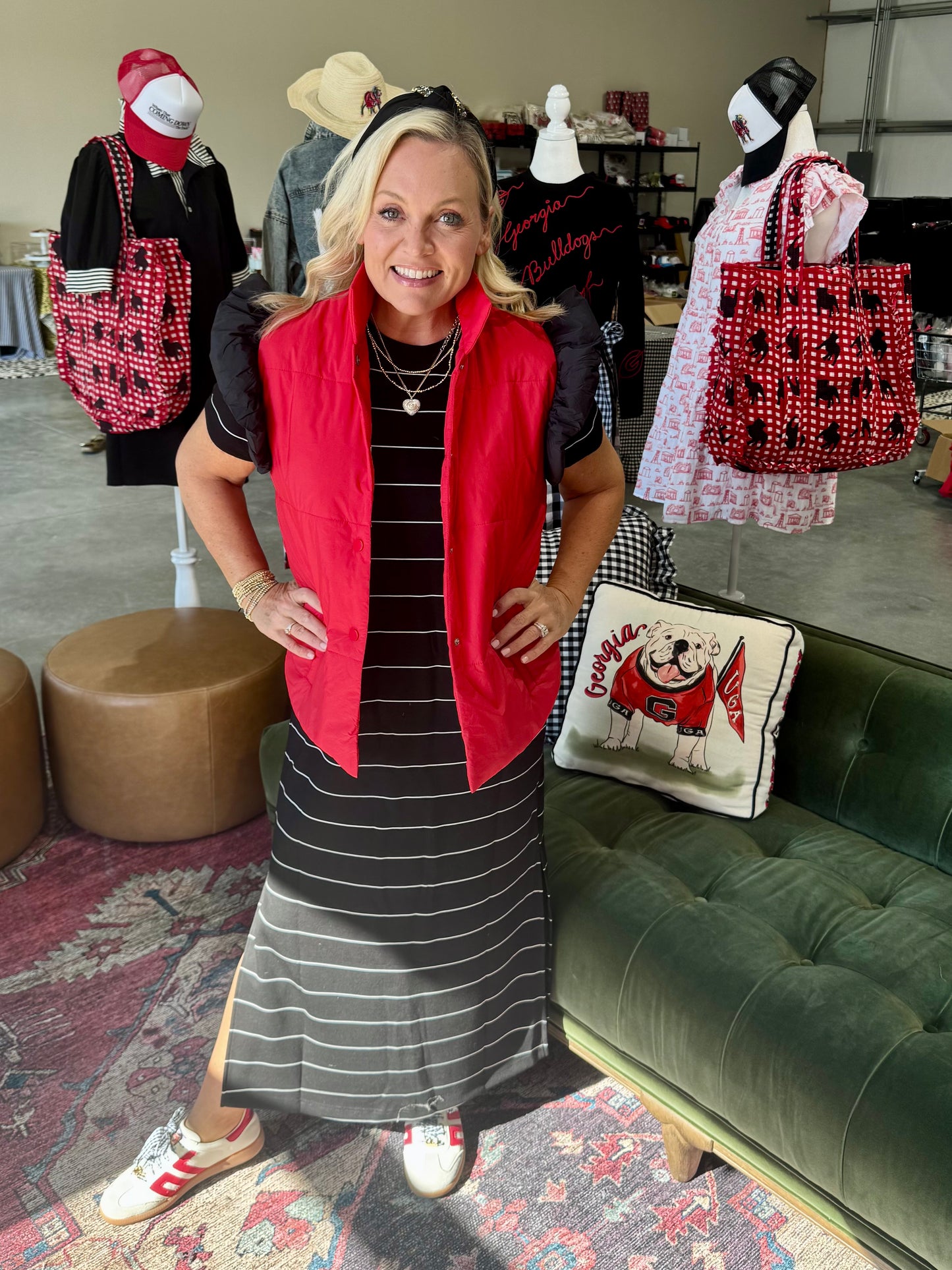 red puffer vest with black ruffle sleeves