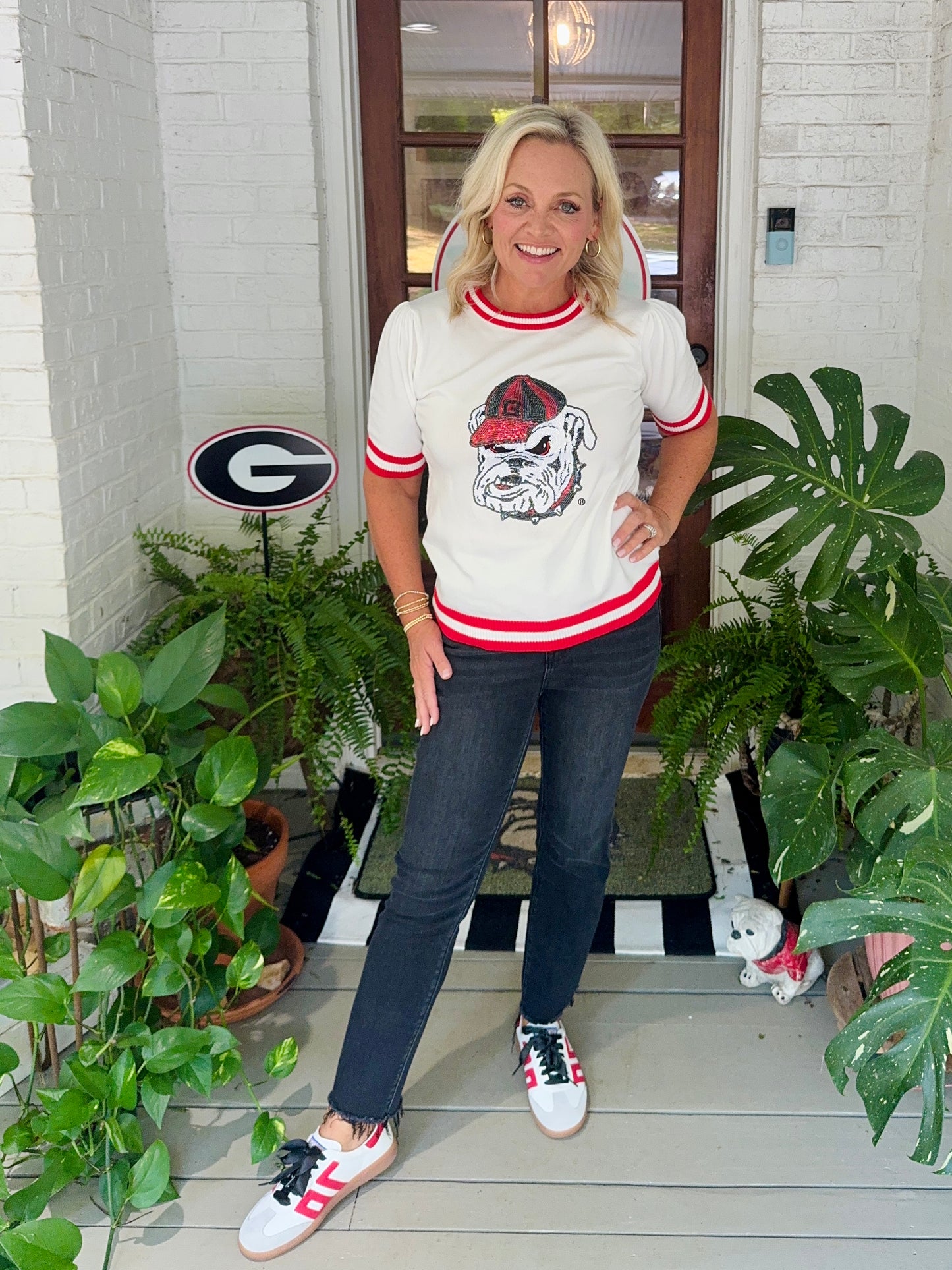 Varsity light weight knit sweater with stripe neckline sequin bulldog