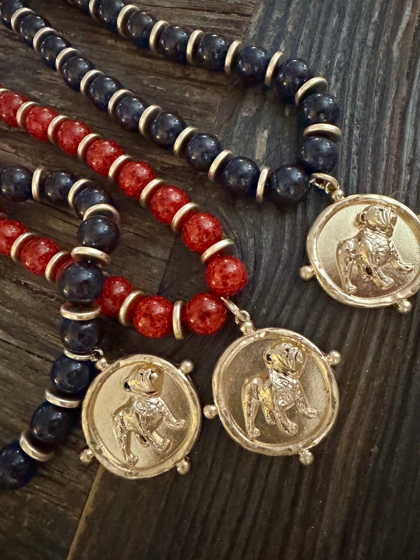 Black or red beaded necklace with gold metal bulldog medalion