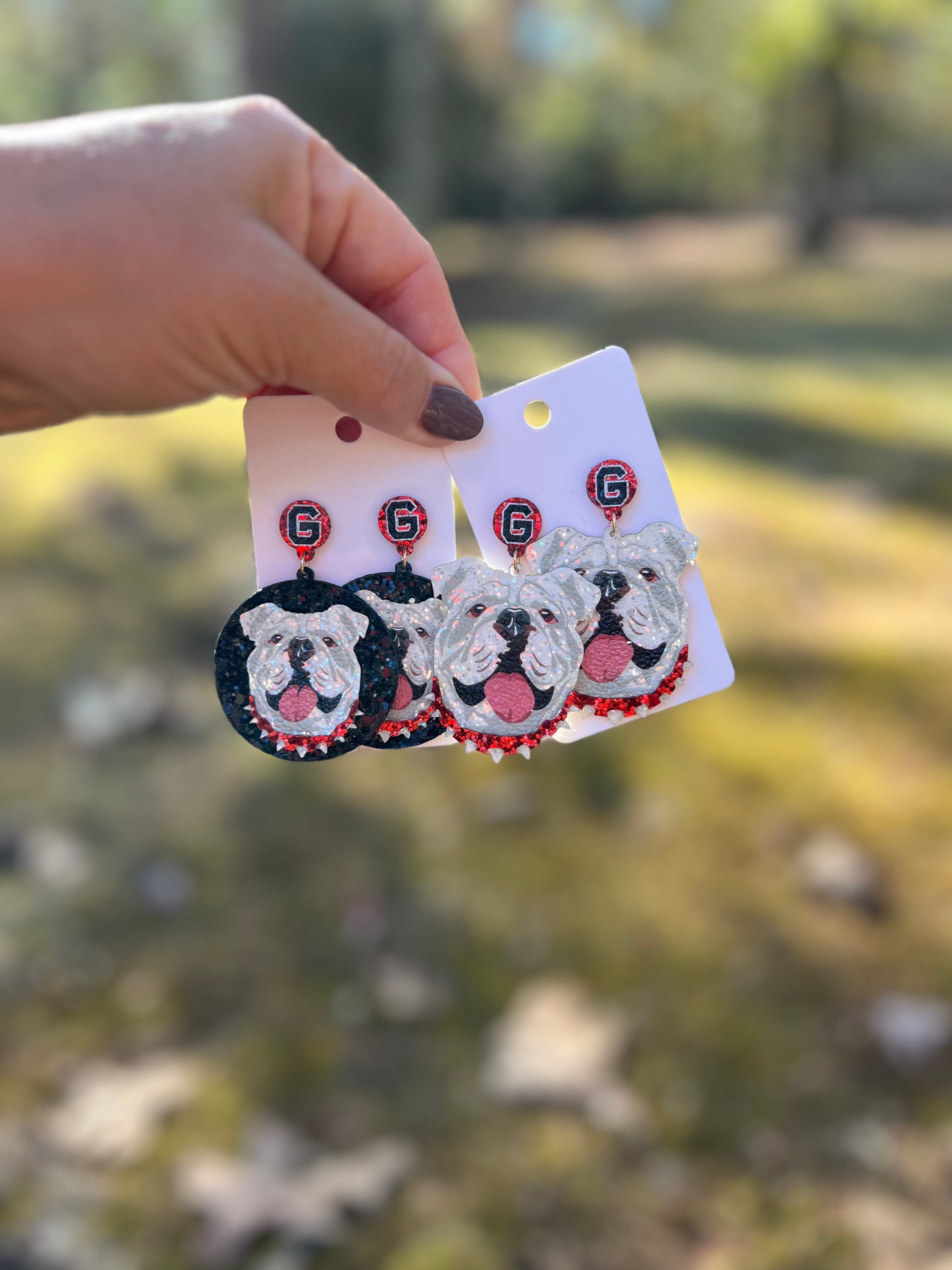 Black background dog earrings sparkly