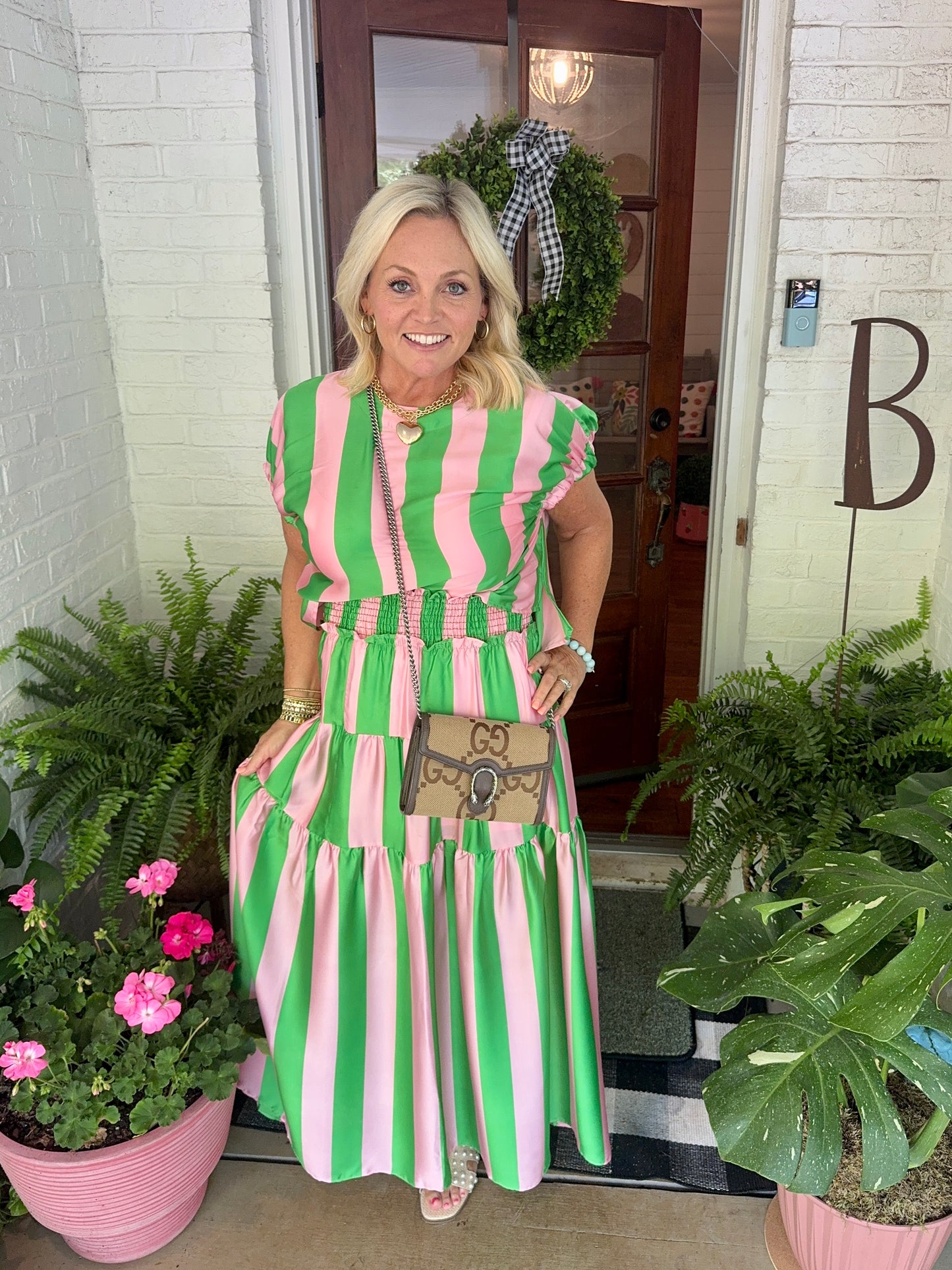 Summer green and pink striped top marked down