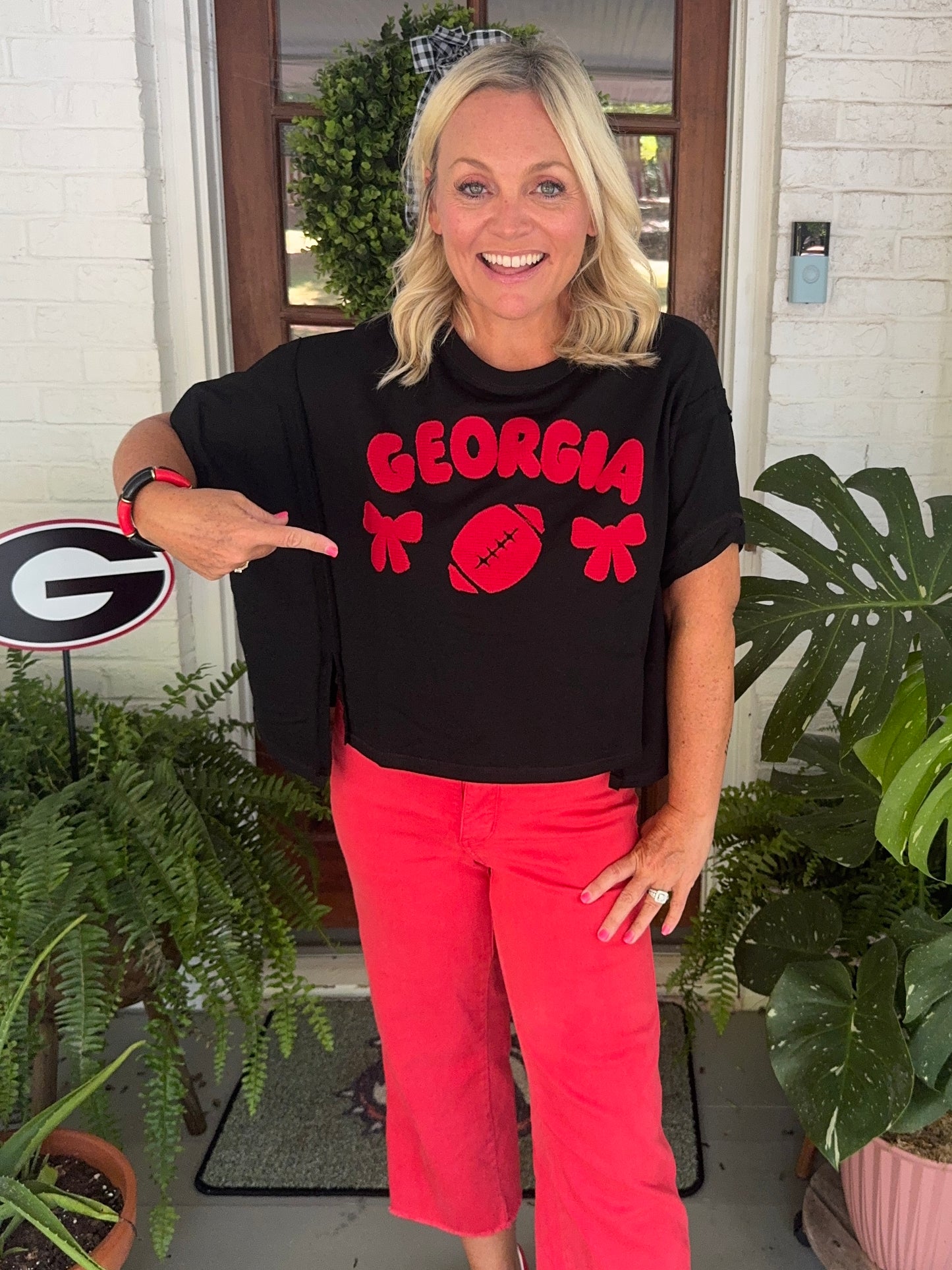 Oversized top slightly cropped black with red patches