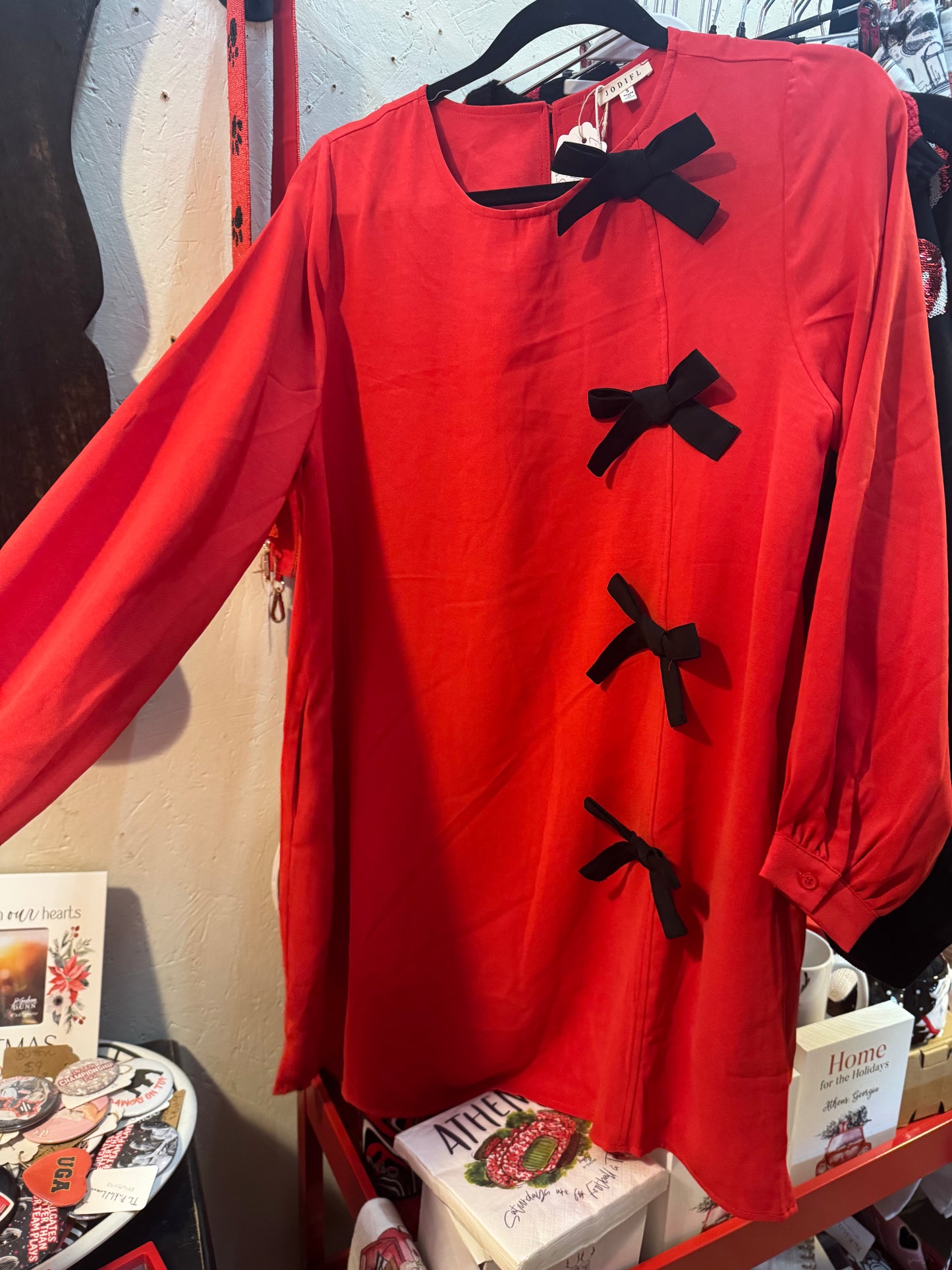 Red dress black bows marked down