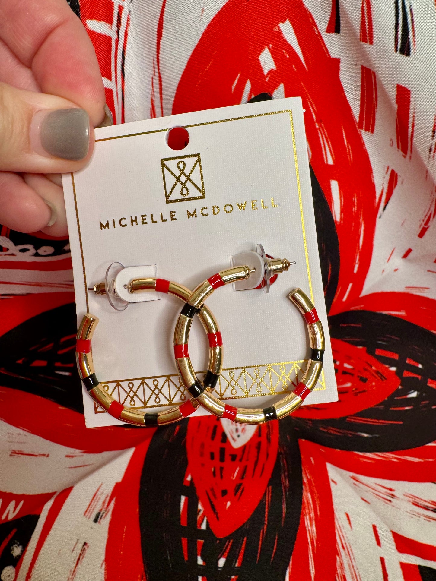 Gold, black and red hoops metal