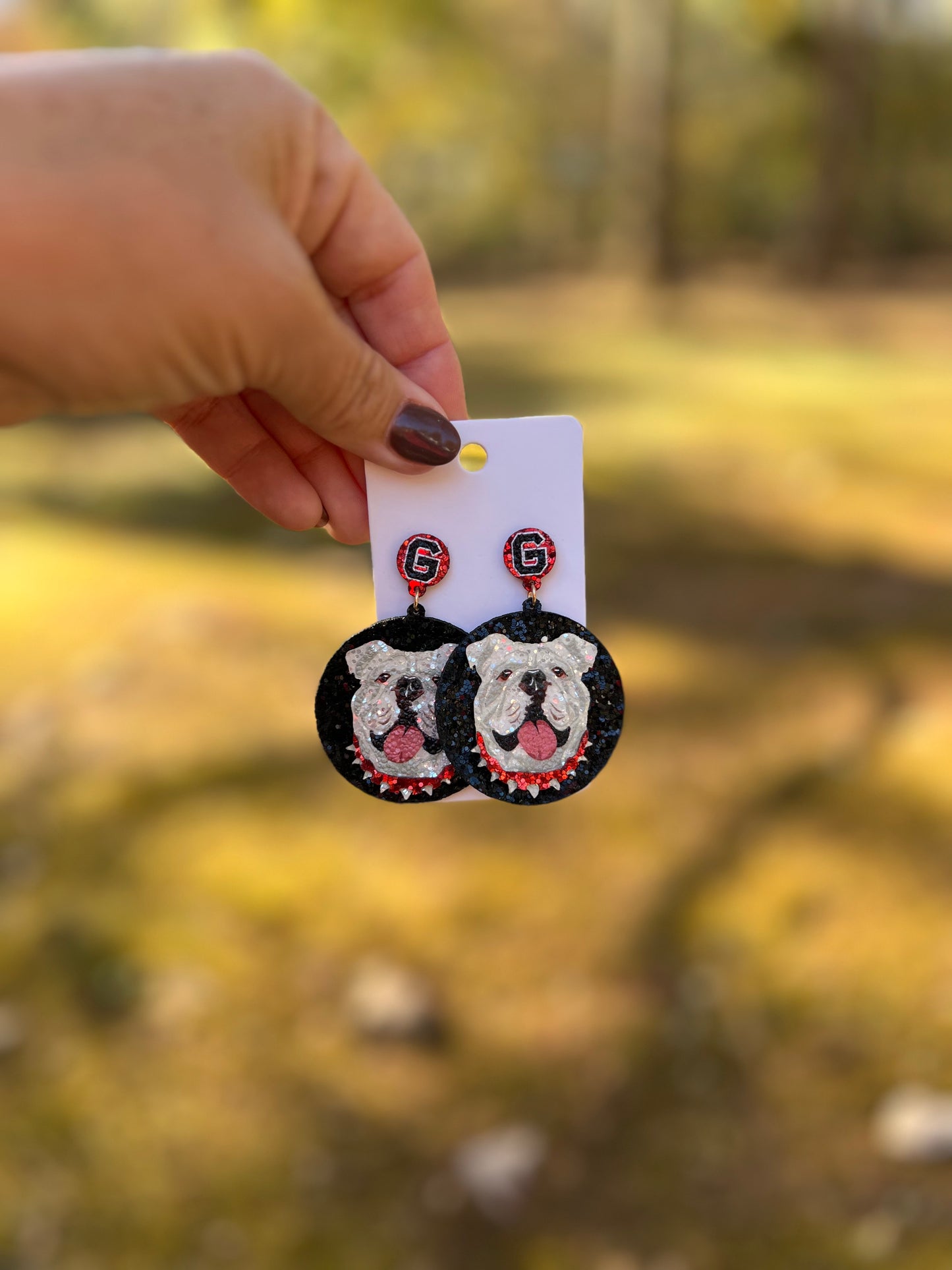 Black background dog earrings sparkly