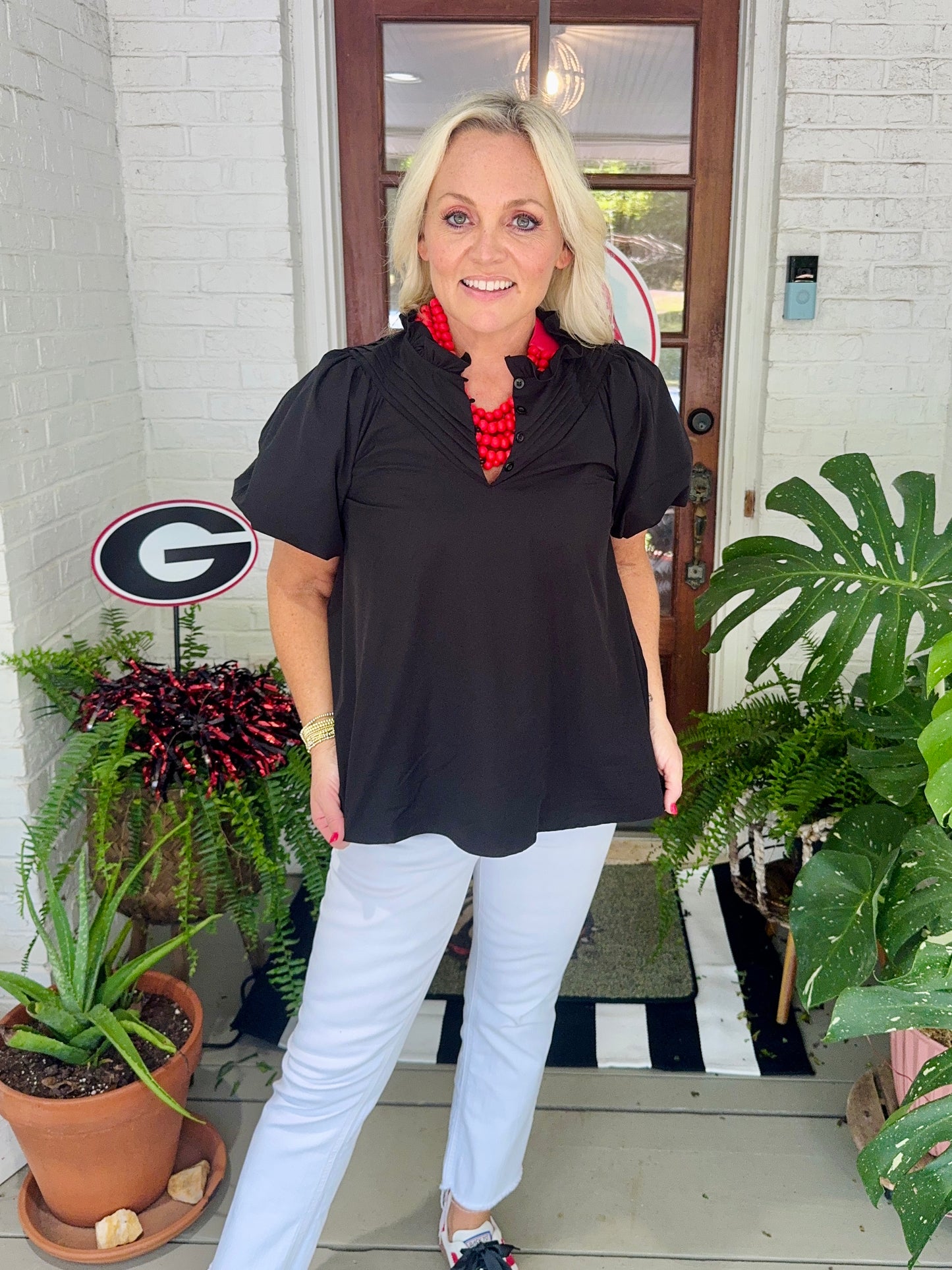 Ruffled neckline relaxed fit pleats detail top black