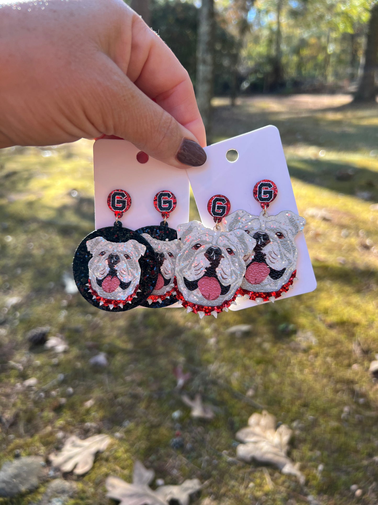 Black background dog earrings sparkly