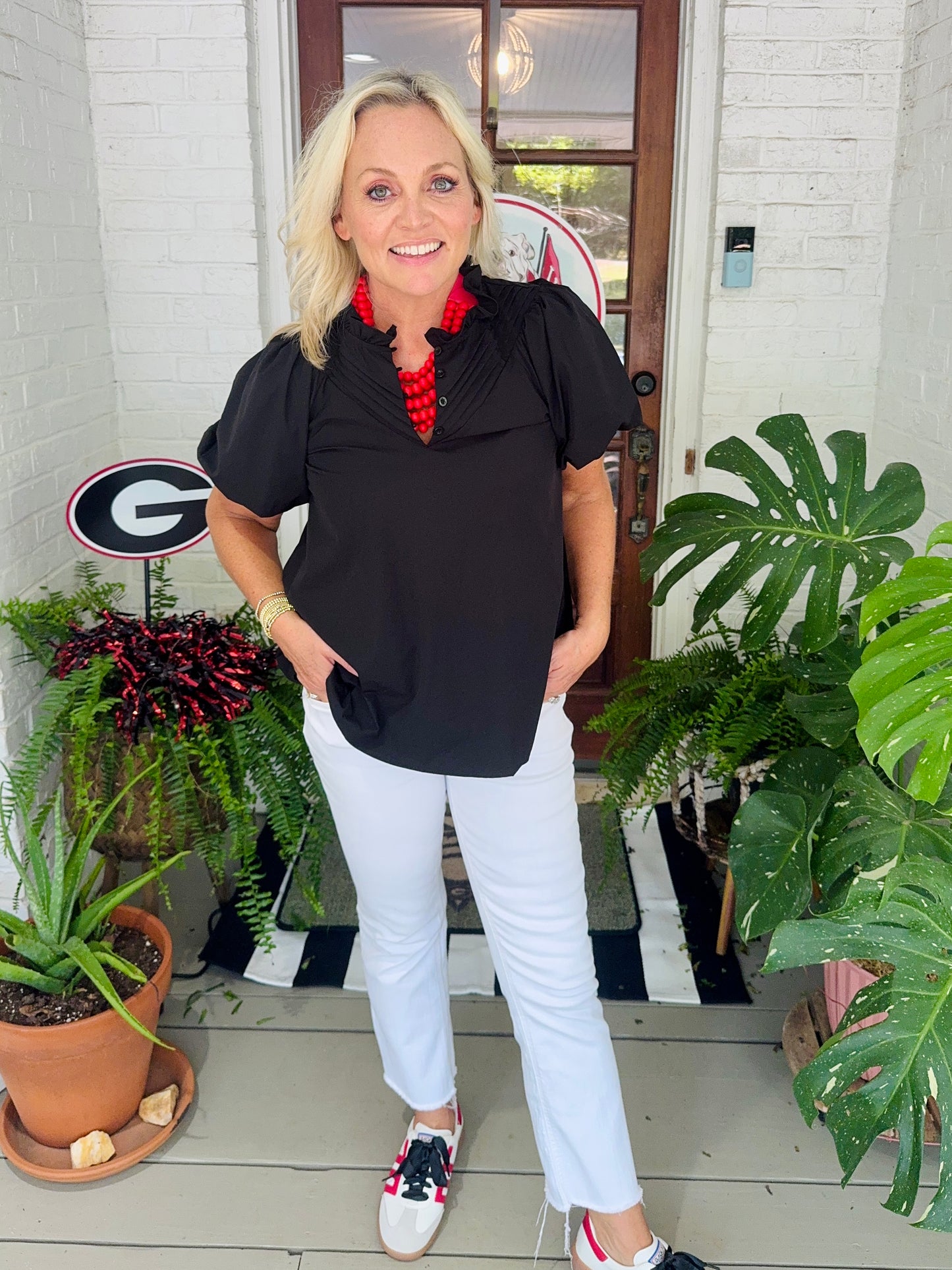 Ruffled neckline relaxed fit pleats detail top black