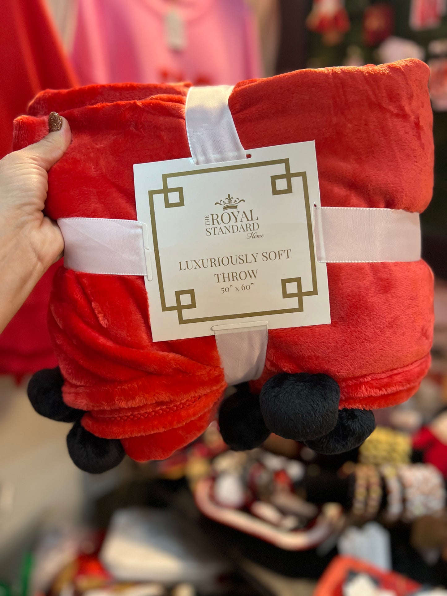 Red and black pom pom throw marked down