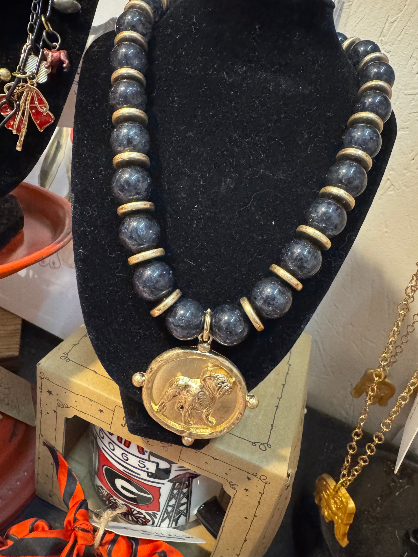 Black or red beaded necklace with gold metal bulldog medalion