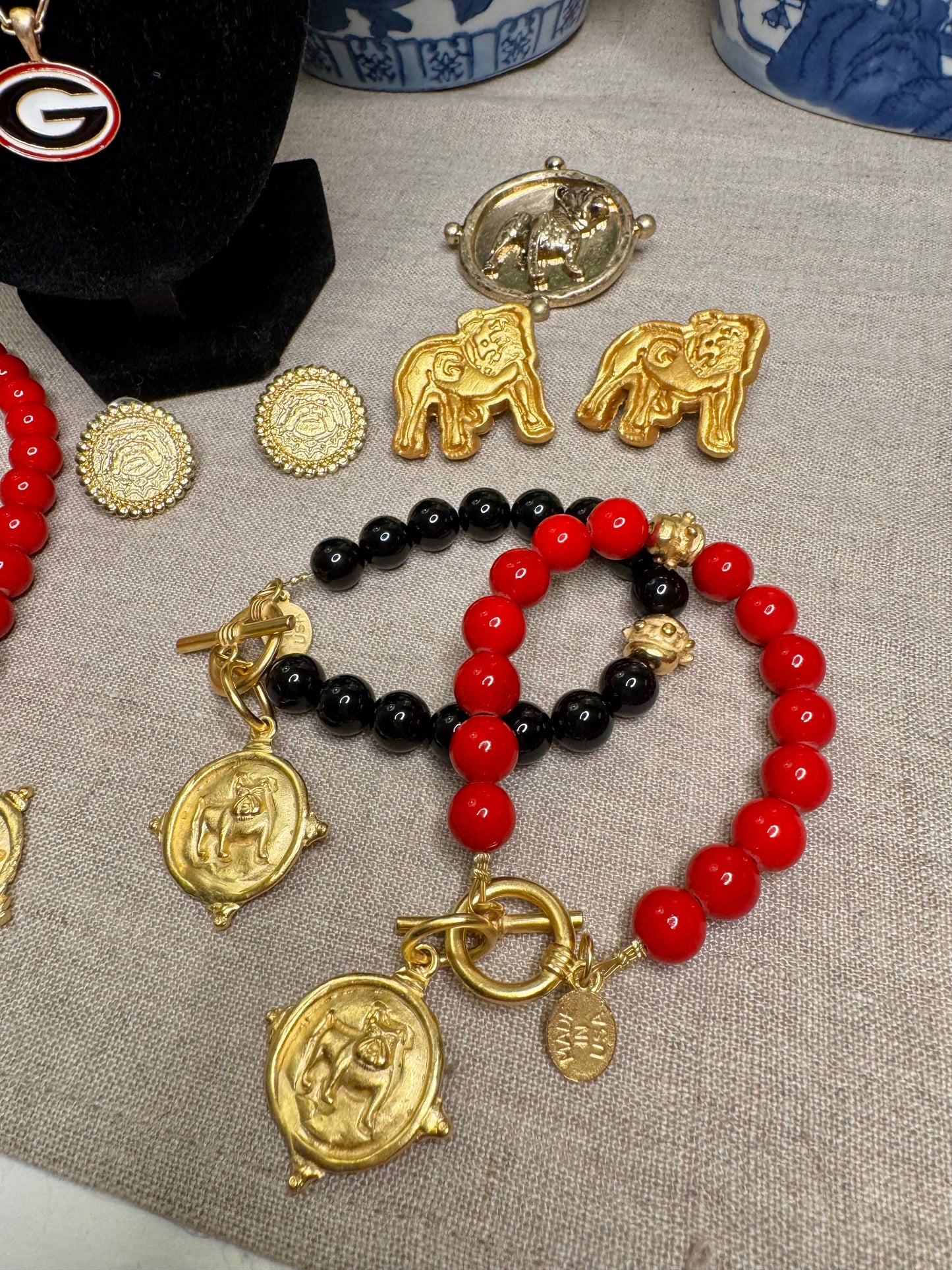 Gold dog medallion bracelet red coral Susan Shaw