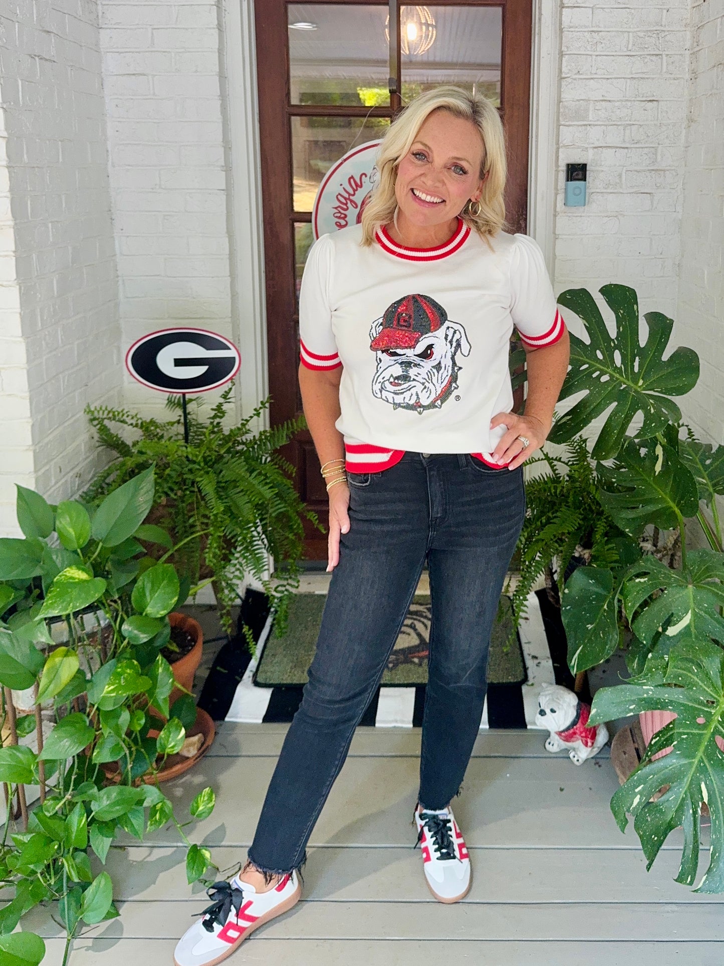 Varsity light weight knit sweater with stripe neckline sequin bulldog