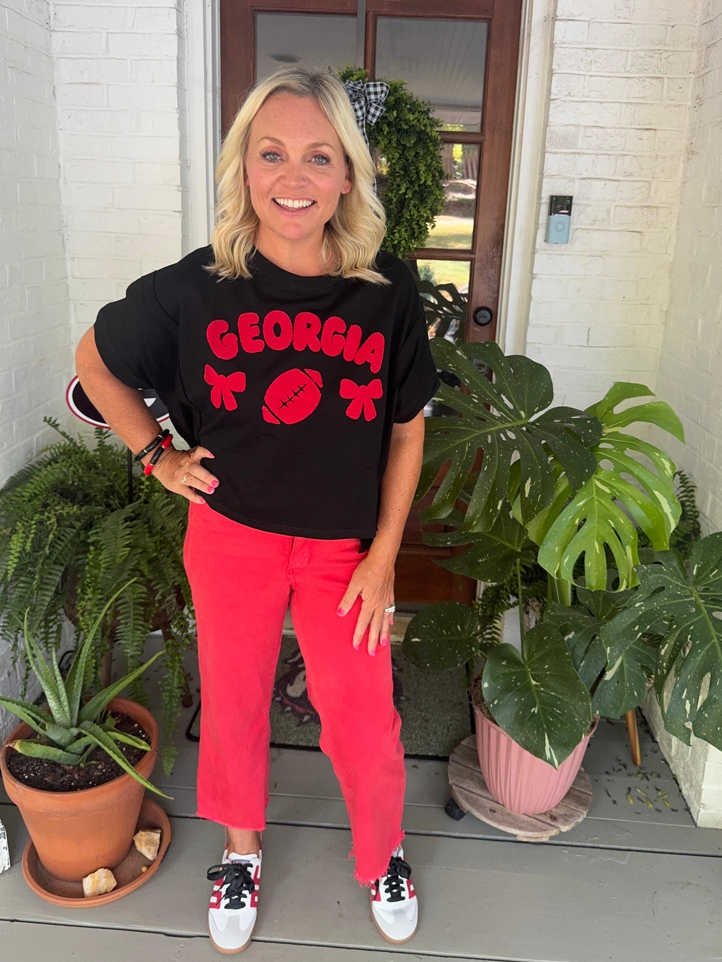 Oversized top slightly cropped black with red patches