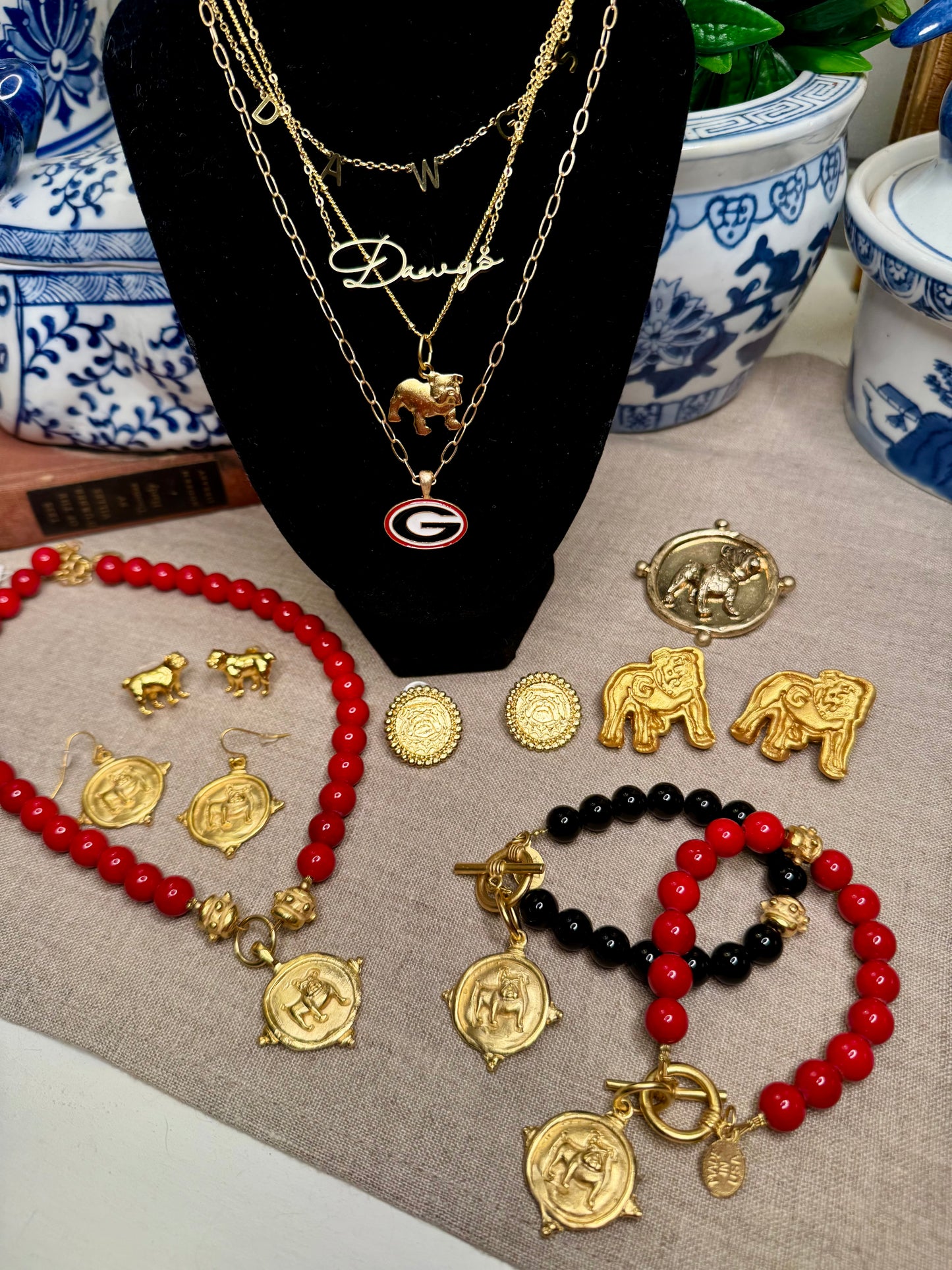 Gold dog medallion bracelet red coral Susan Shaw
