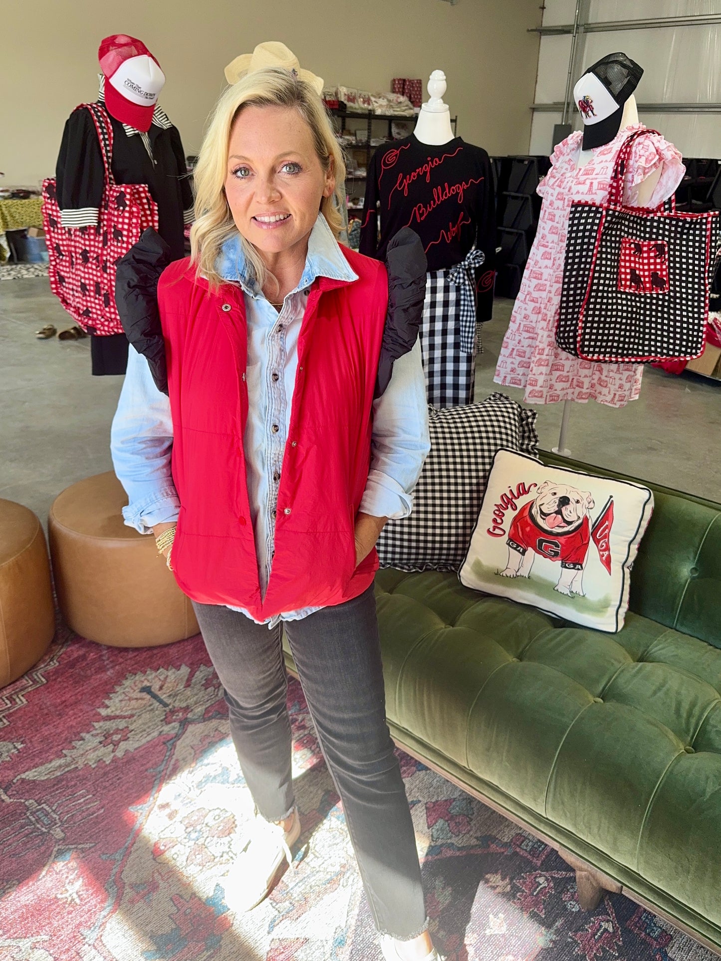 red puffer vest with black ruffle sleeves
