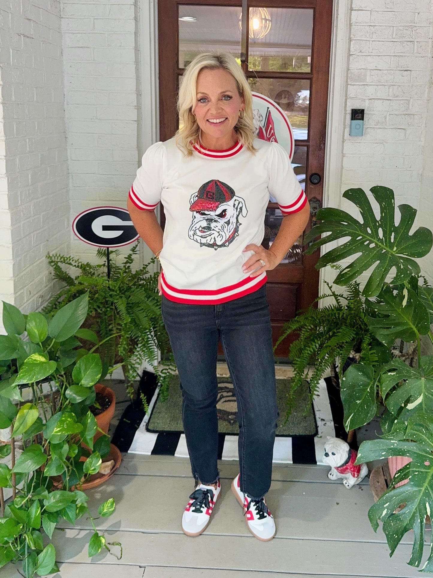 Varsity light weight knit sweater with stripe neckline sequin bulldog
