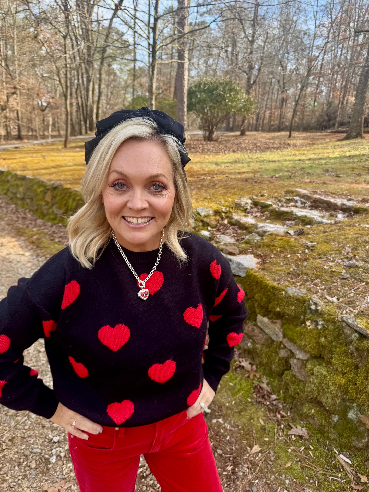 Black sweater red hearts Valentine’s Day marked down