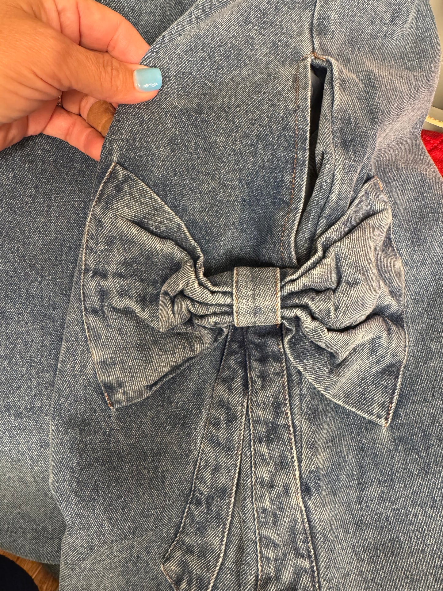 Denim dress with bows marked down
