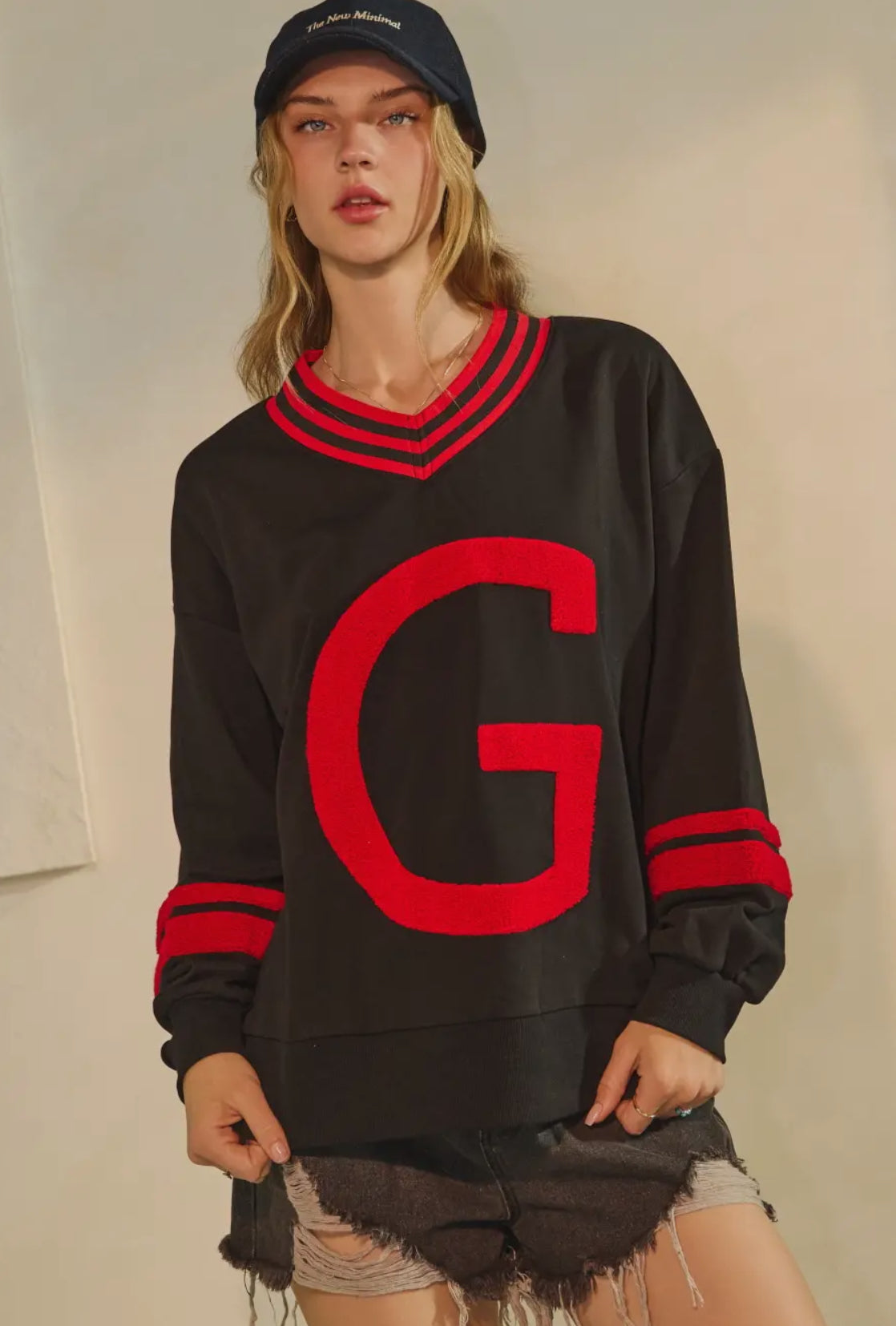 Black pullover with Giant red fuzzy G