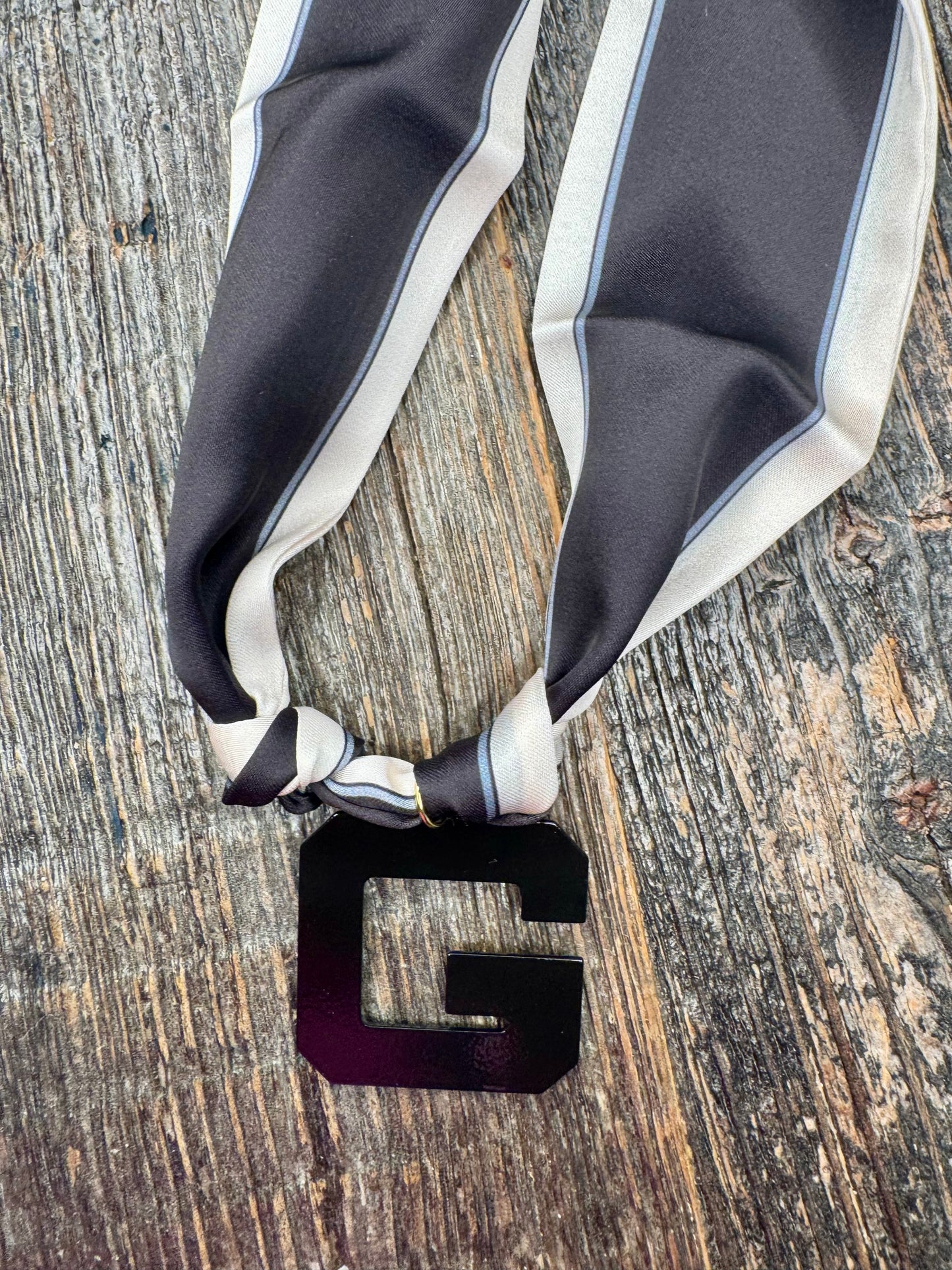 Black G charm scarf necklace