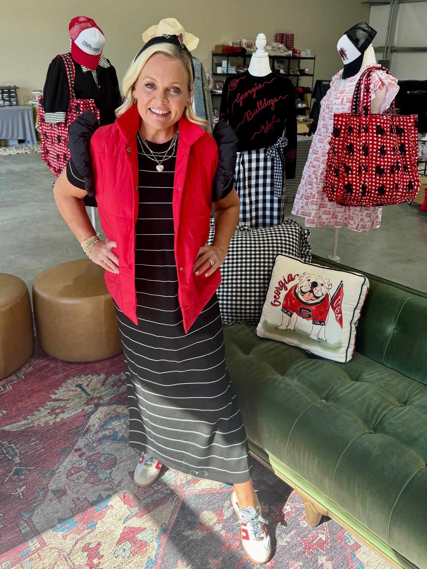 red puffer vest with black ruffle sleeves