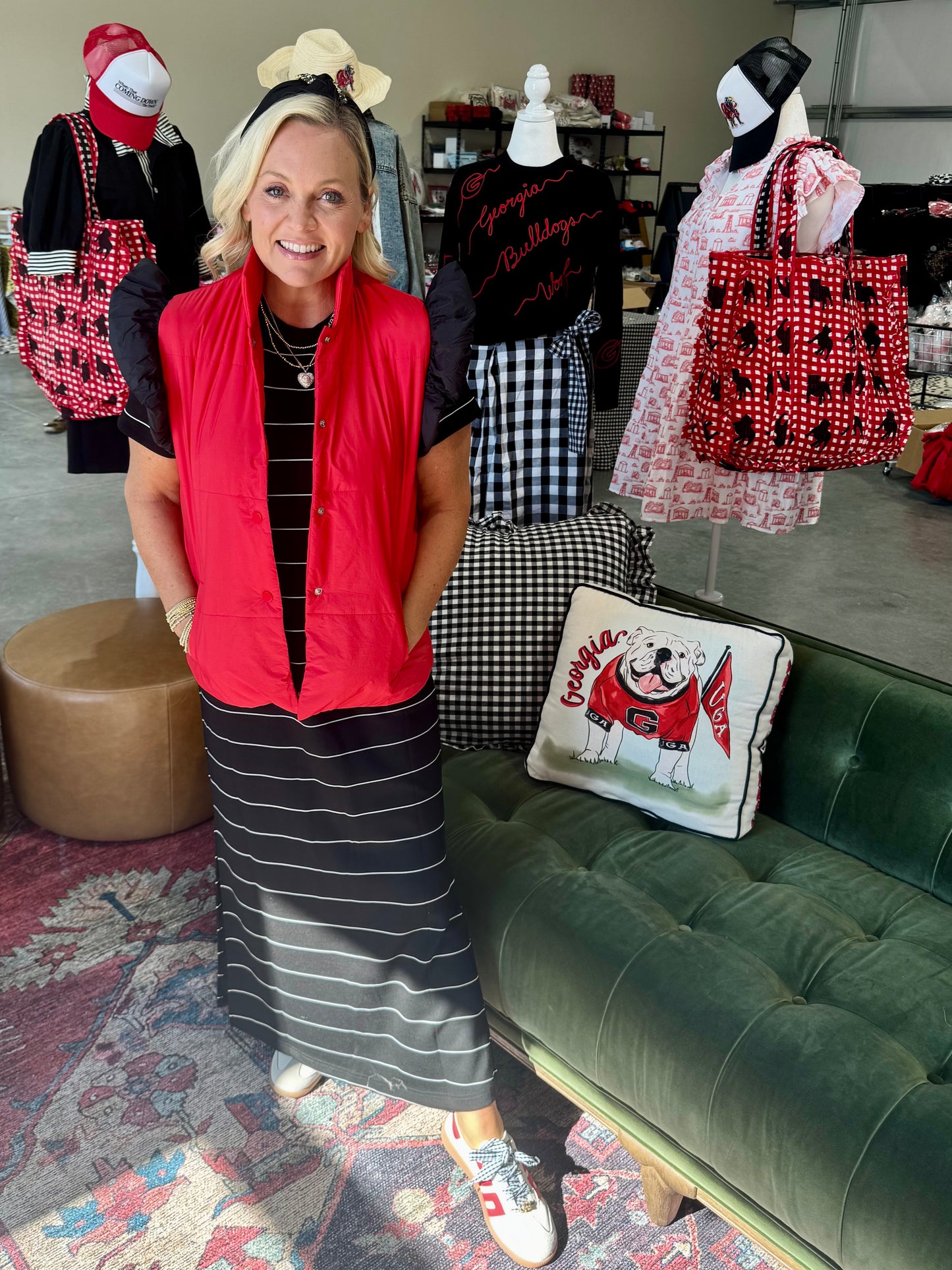 red puffer vest with black ruffle sleeves