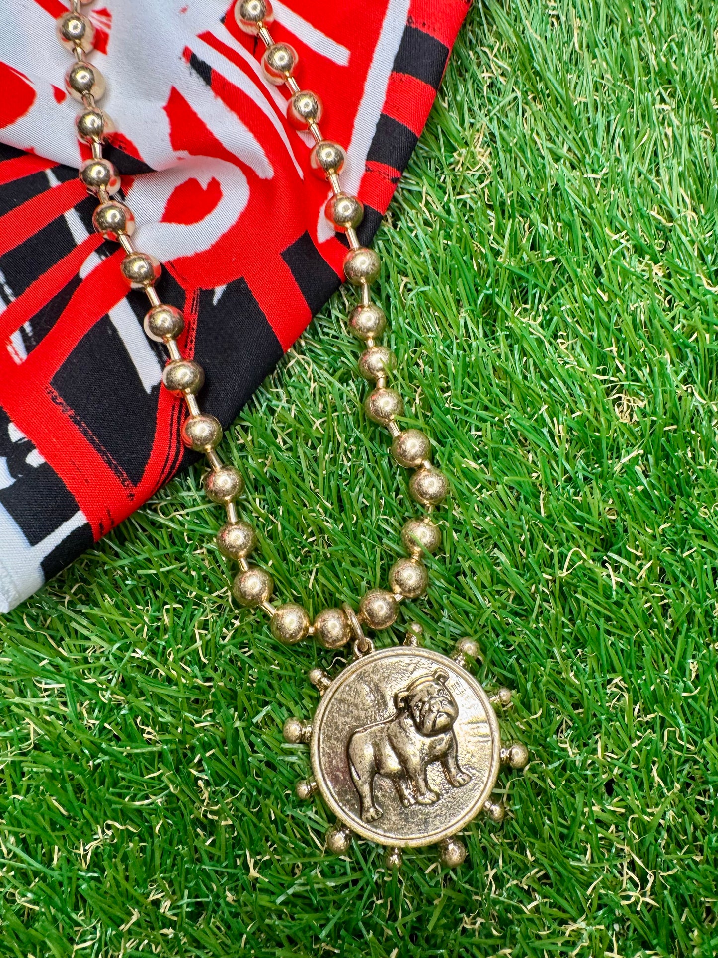 Metal gold necklace with dog medallion