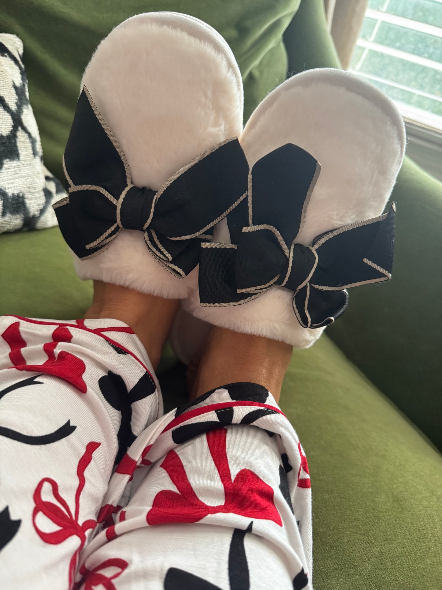 Cozy cream slippers black bow goes great with pajamas!