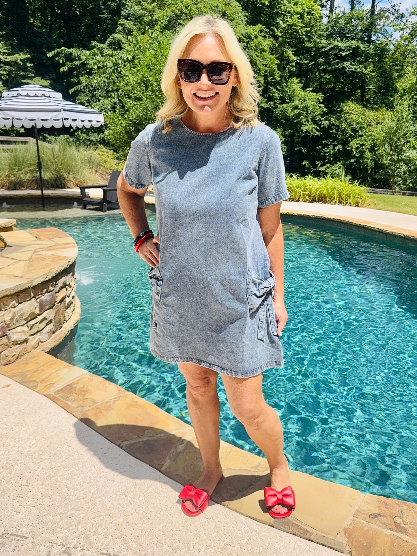 Denim dress with bows marked down