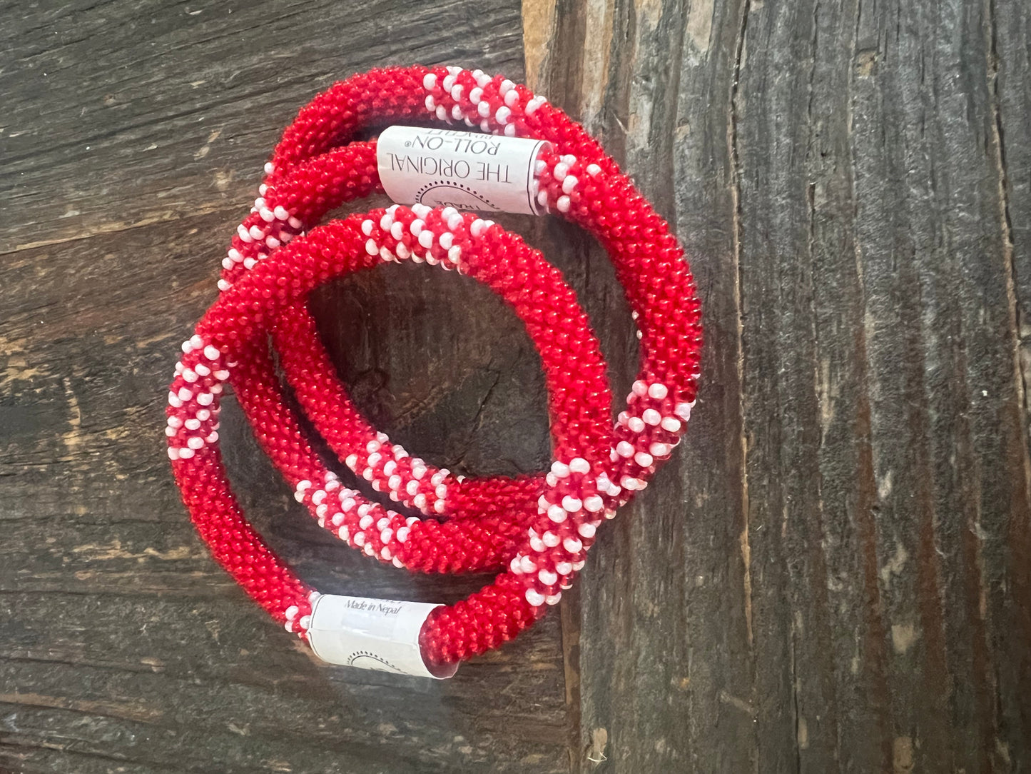 roll on aide trade beaded bracelet