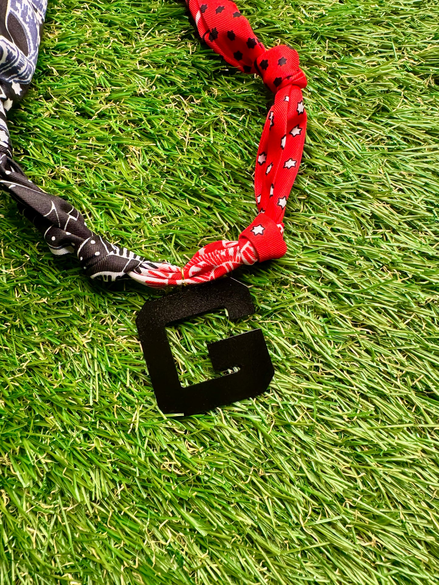 Black G charm scarf necklace