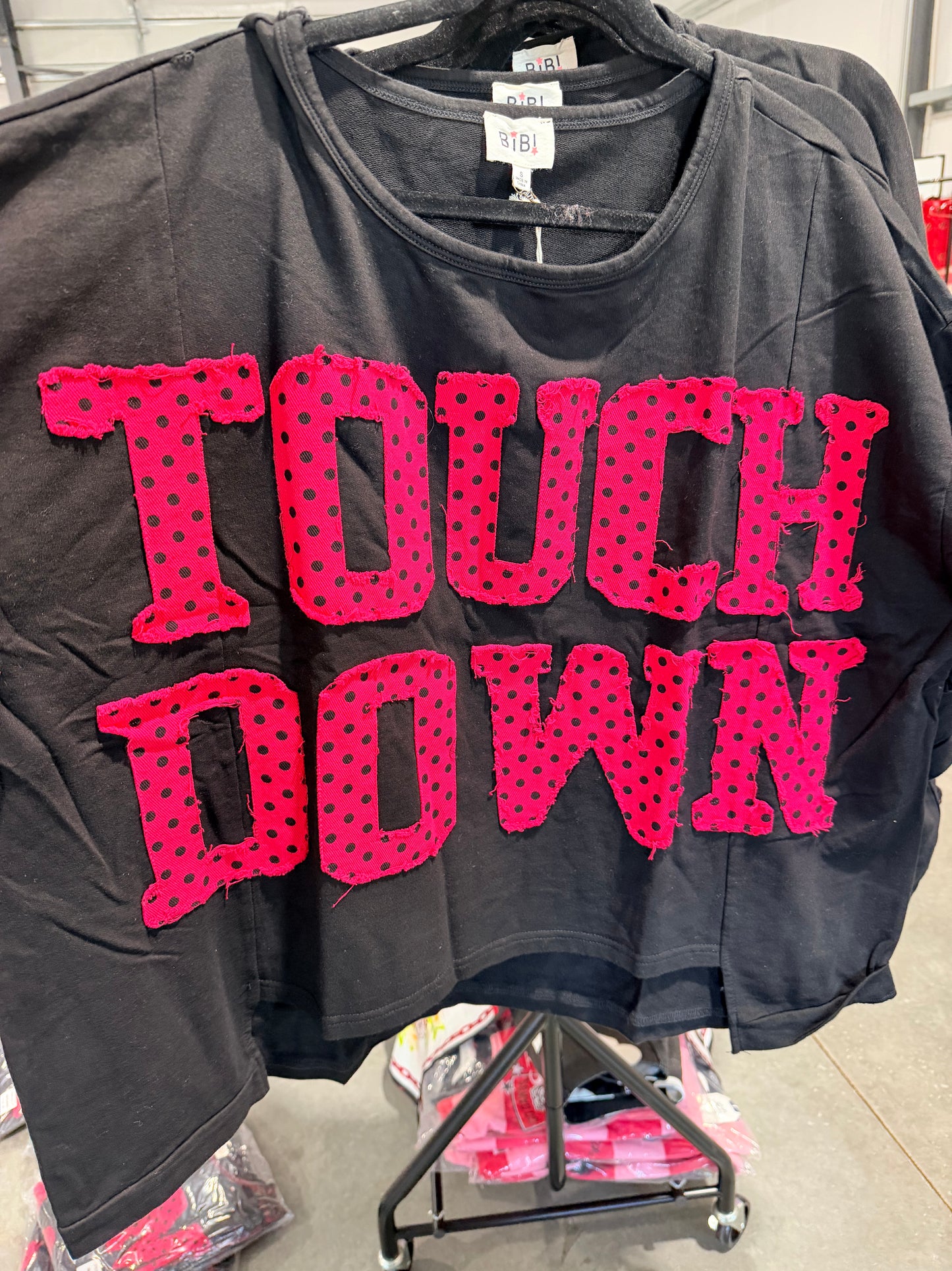 Touch down oversized black top