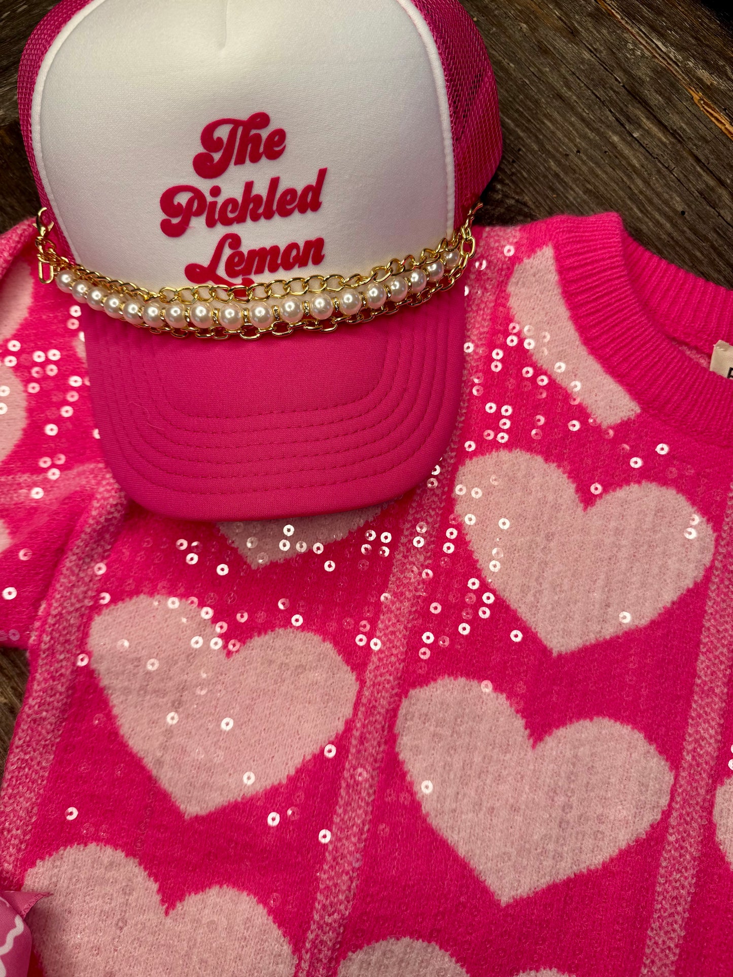 The Pickled Lemon pink trucker hat