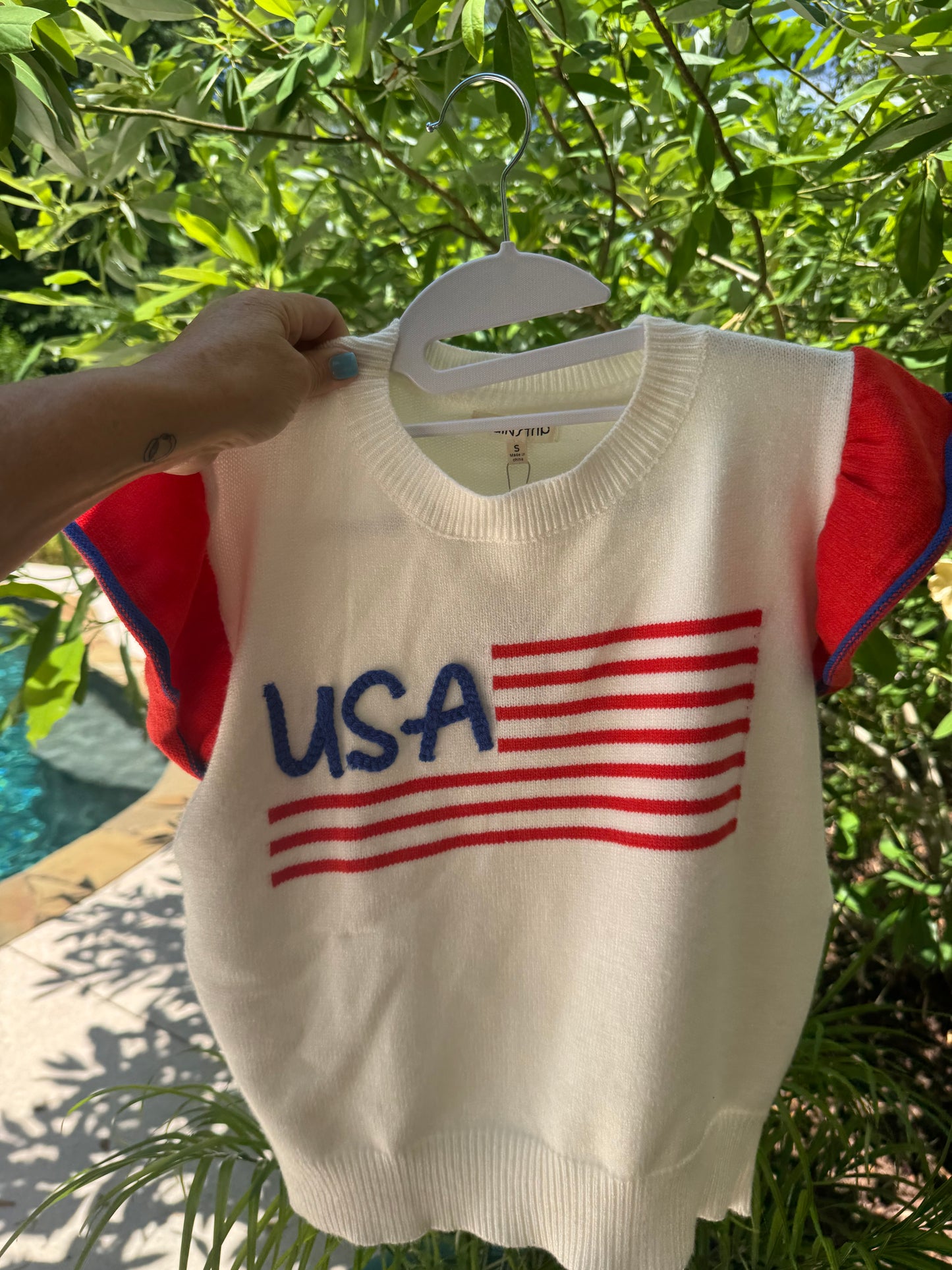 White flag USA knit top with ruffle flutter sleeves marked down