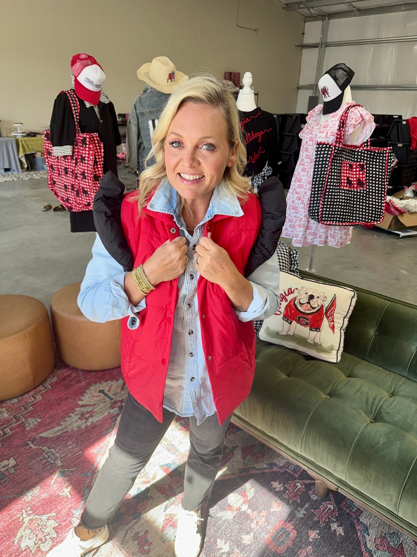 red puffer vest with black ruffle sleeves