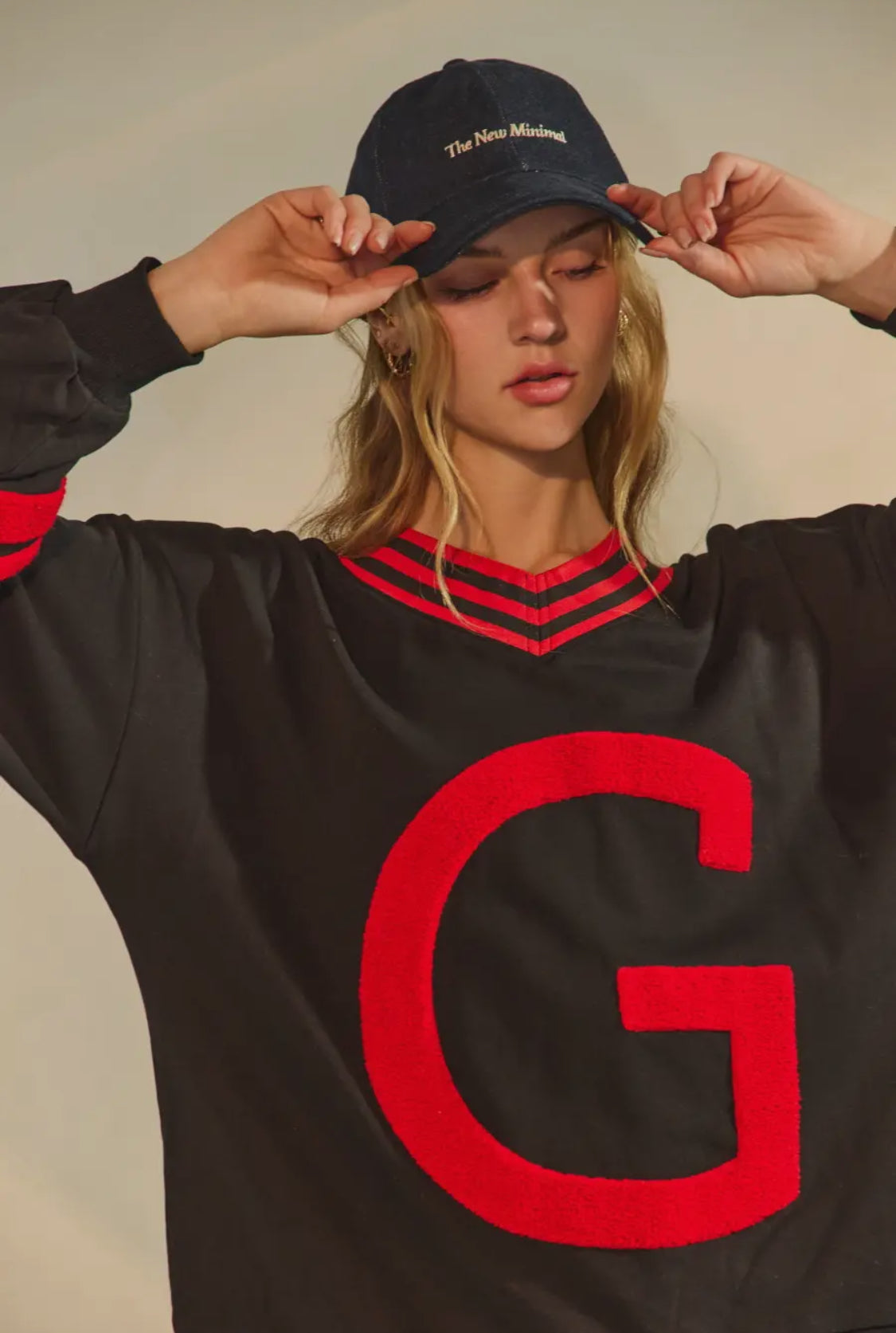Black pullover with Giant red fuzzy G