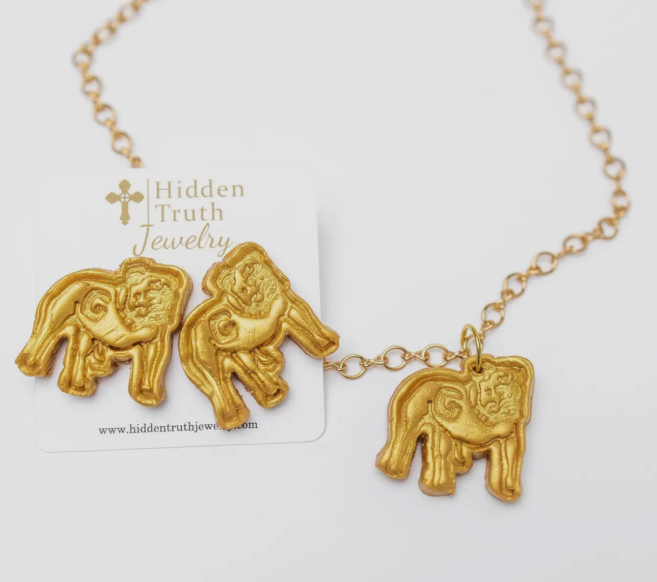 Dog earrings gold